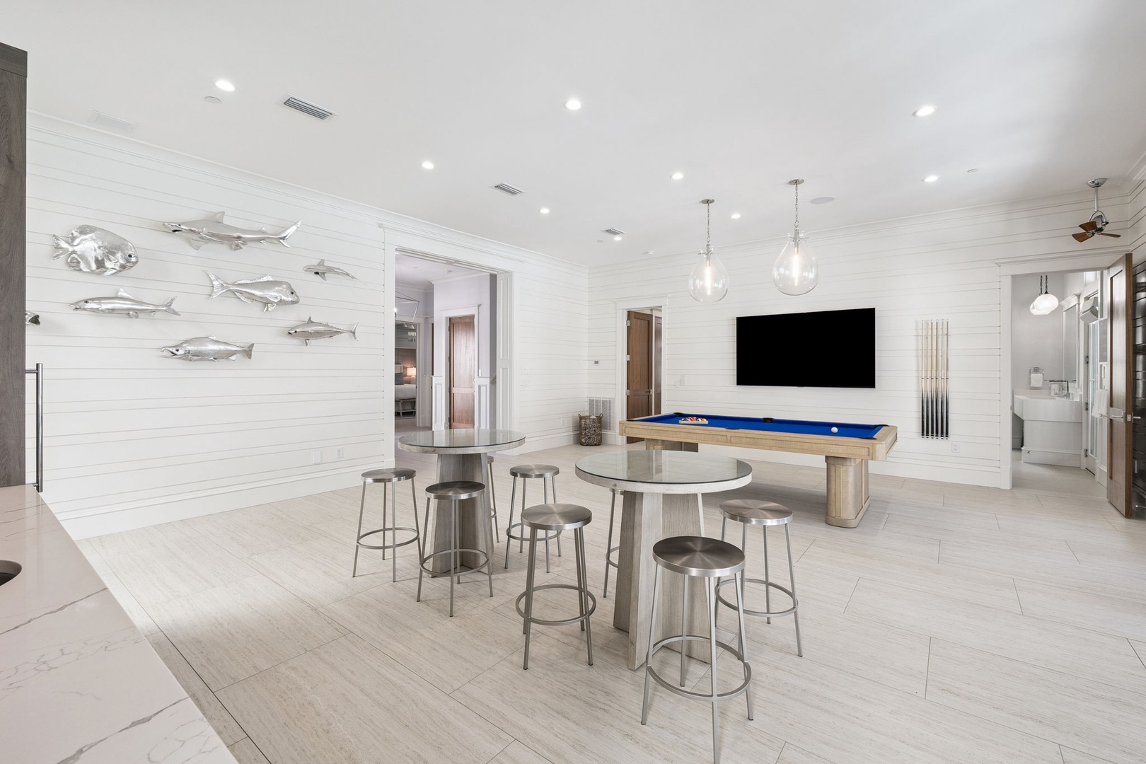 Challenge friends to pool while enjoying the modern entertainment space with high-top seating and coastal-inspired decor.