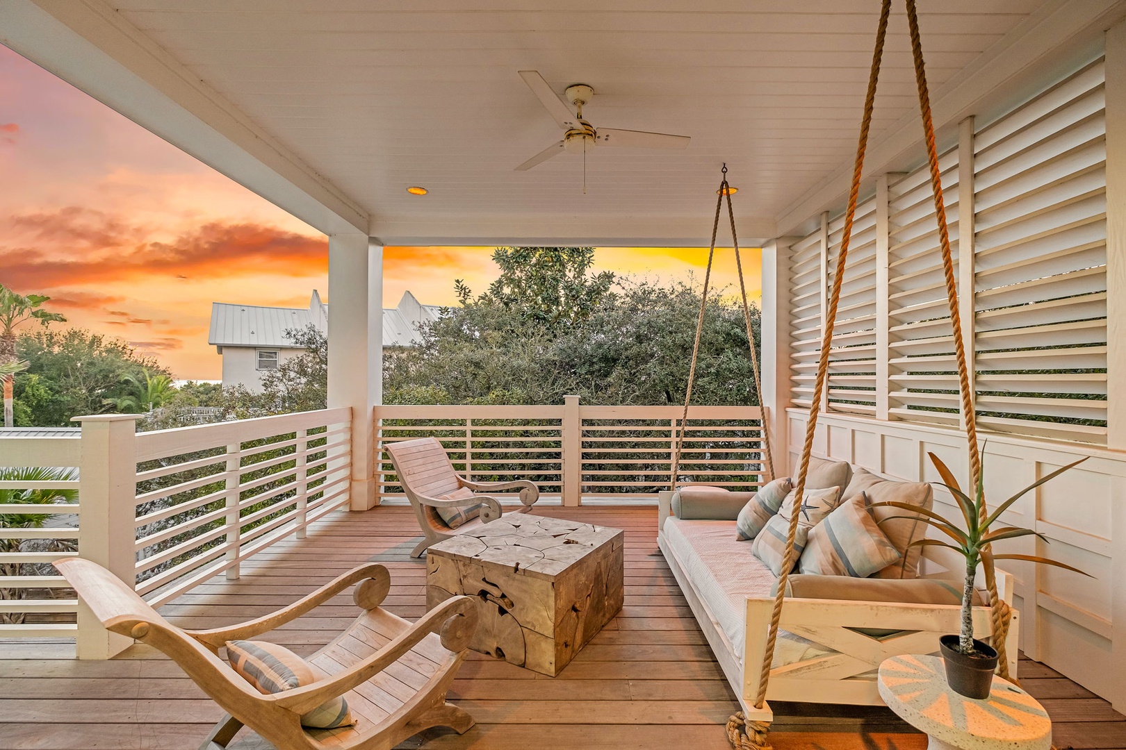 Unwind on your private covered deck with stunning sunset views, swaying gently on the rope swing while tropical breezes flow through.