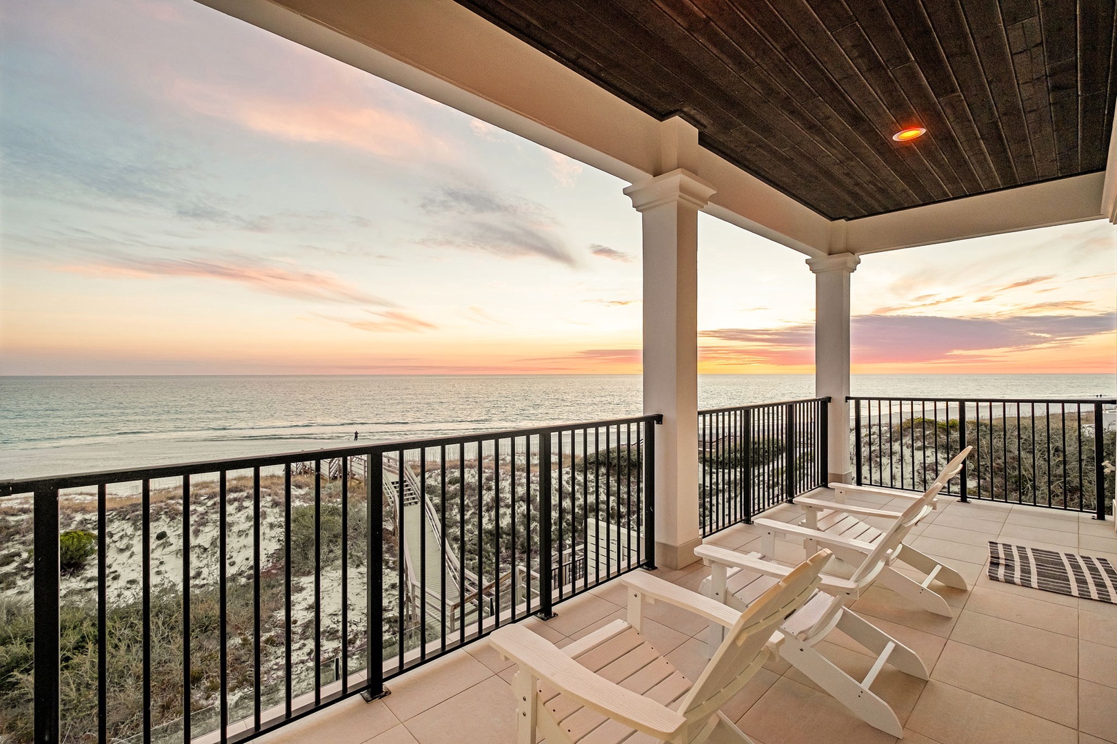 Wake up to stunning sunrise views from your private oceanfront balcony, where comfortable loungers await your morning coffee moments.