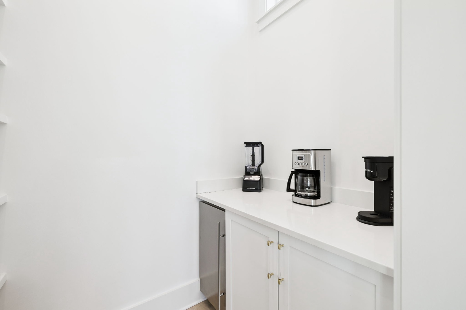 Your morning coffee ritual begins here with premium appliances ready to brew your perfect cup and blend fresh ingredients.