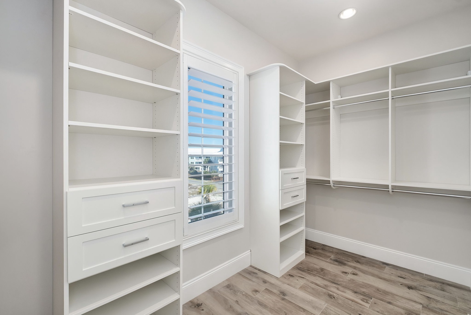 Your spacious walk-in closet offers abundant storage with custom shelving, drawers, and hanging space to keep your wardrobe perfectly organized.