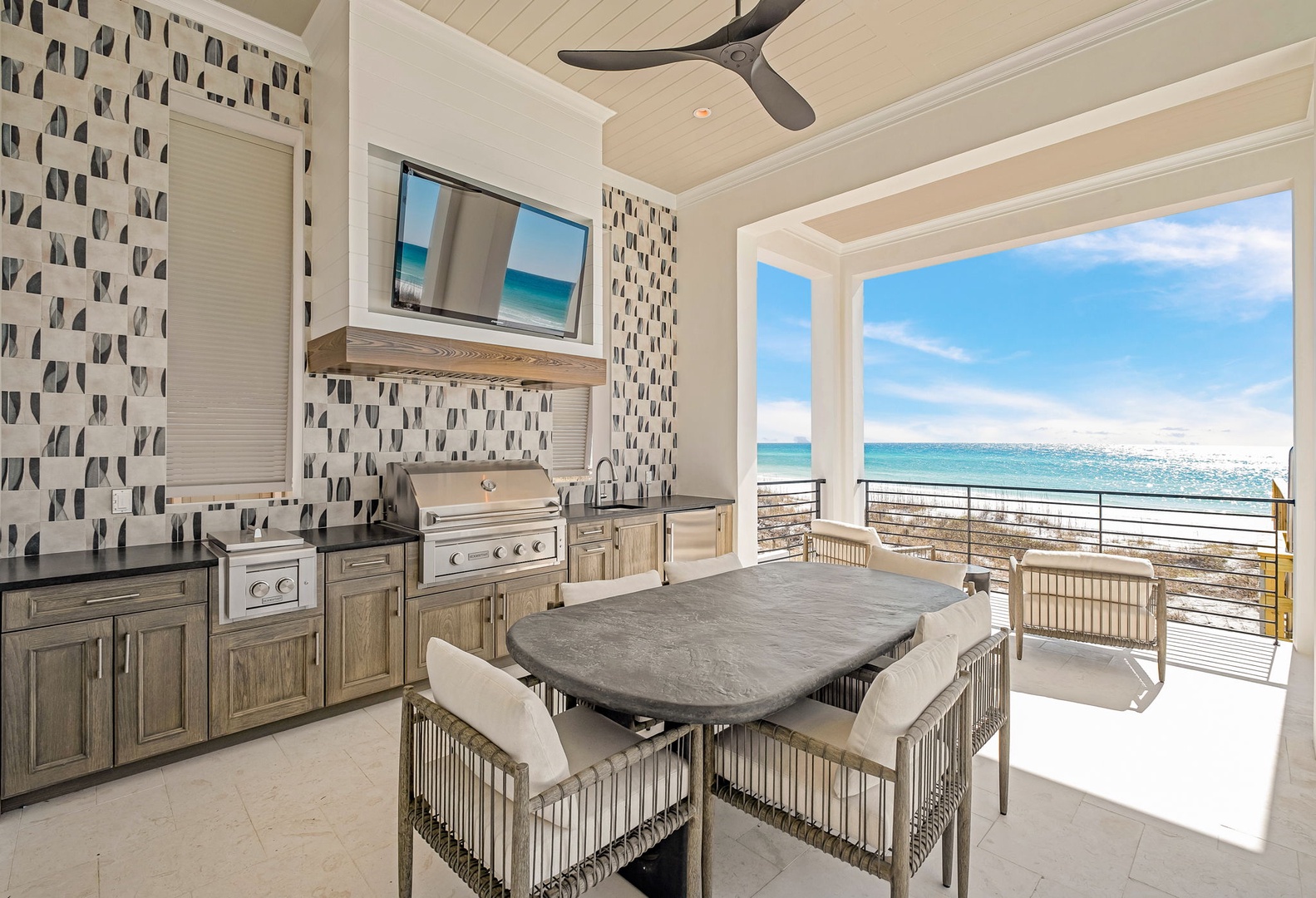 Cook with ocean breezes on your private covered terrace, where stunning sea views make every meal unforgettable.