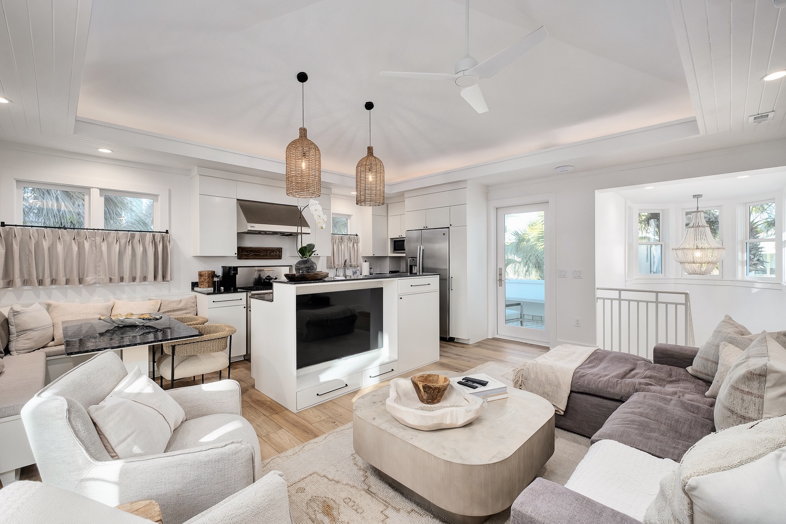 Unwind in your bright, airy living space where coastal elegance meets modern comfort, complete with stunning water views.