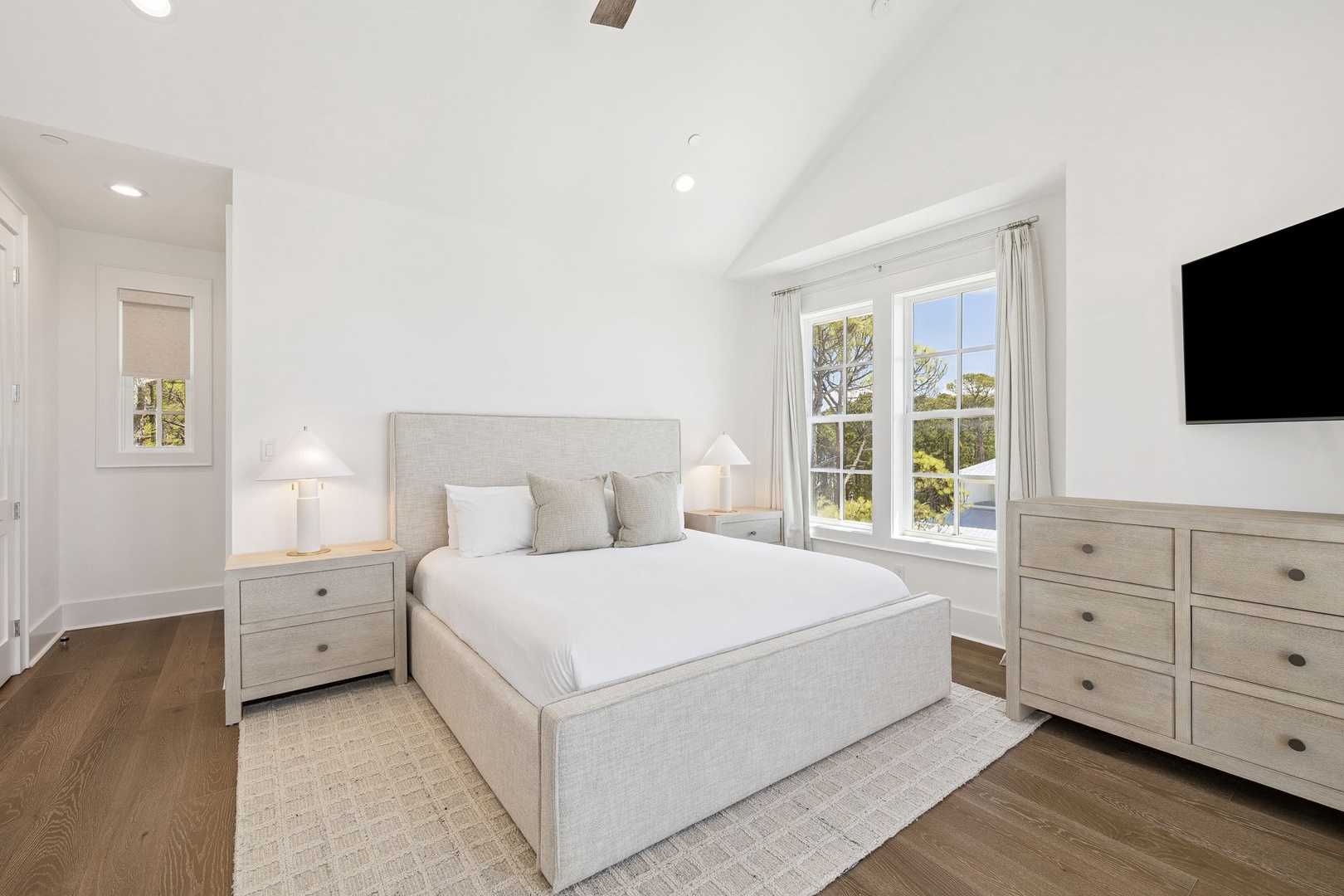 Drift off in your serene bedroom sanctuary, where soft linens and peaceful natural light create the perfect retreat for restful nights.