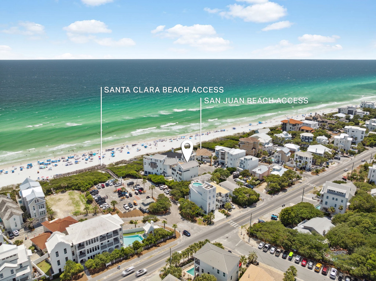 Aerial view of the beachfront property location, steps from two pristine beach access points along the stunning Gulf Coast.