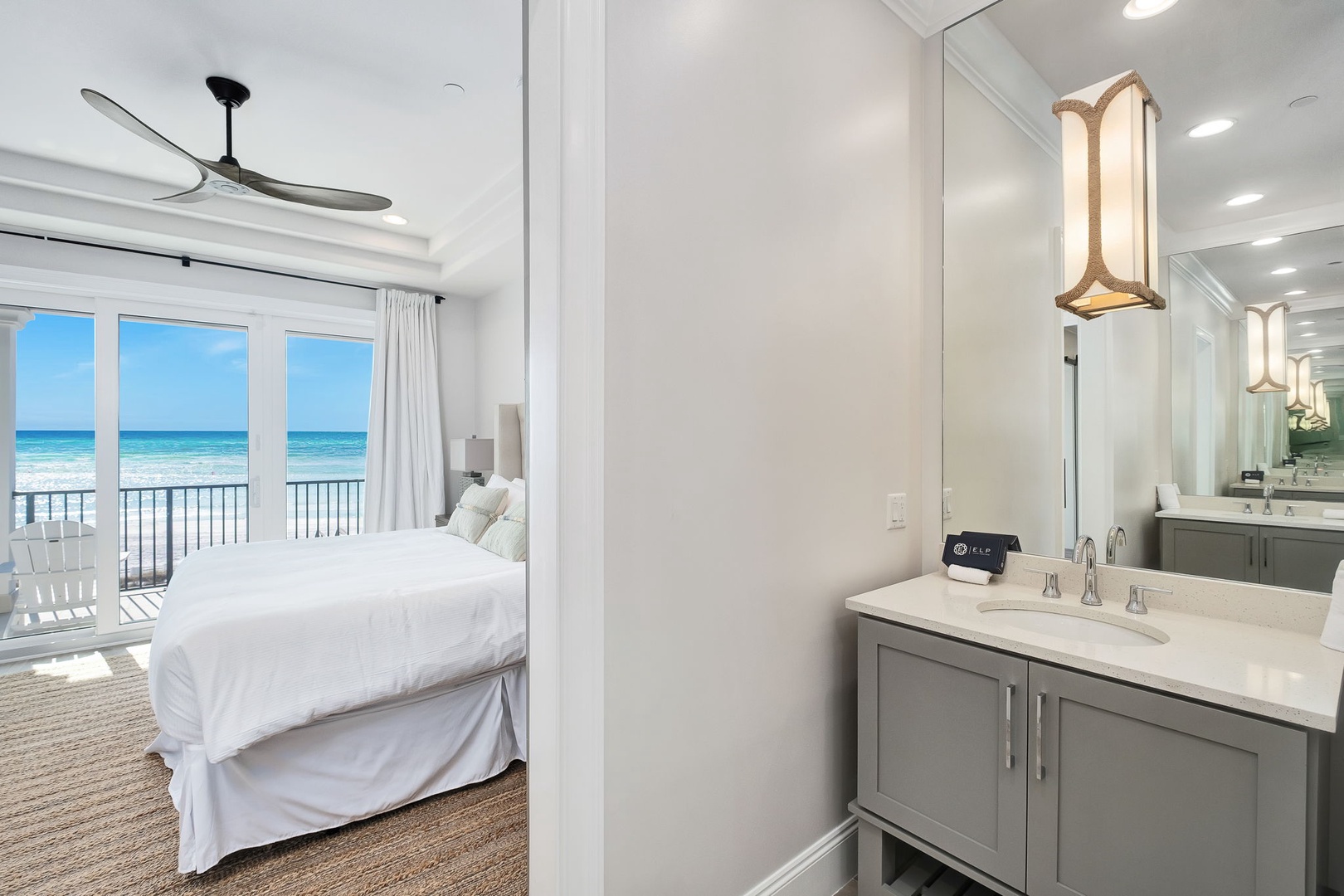 Step into your oceanfront bedroom with stunning sea views, then refresh in your private bathroom featuring elegant finishes.