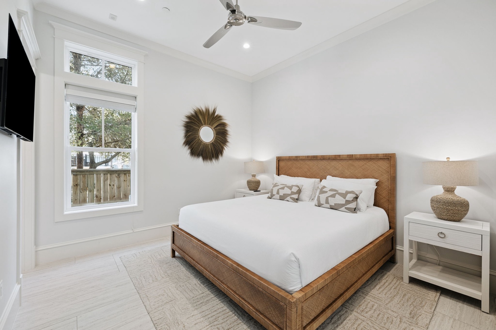 Drift into peaceful sleep in your bright, airy bedroom with crisp linens and natural textures creating the perfect retreat.