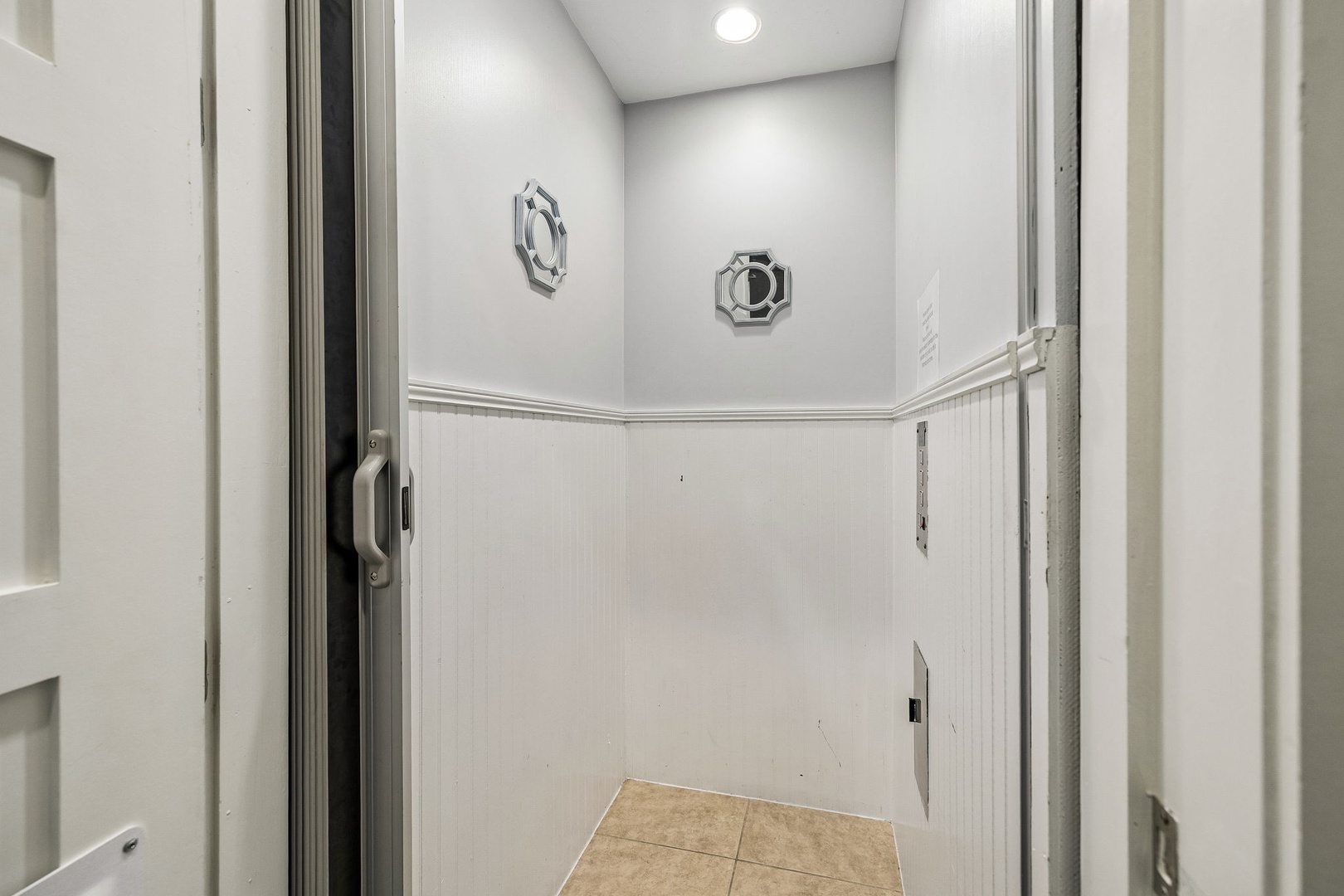 Step into your own private laundry room, conveniently tucked away and ready for your use. The bright, clean space features hook-ups for both washer and dryer, making it easy to refresh your wardrobe during your stay.
