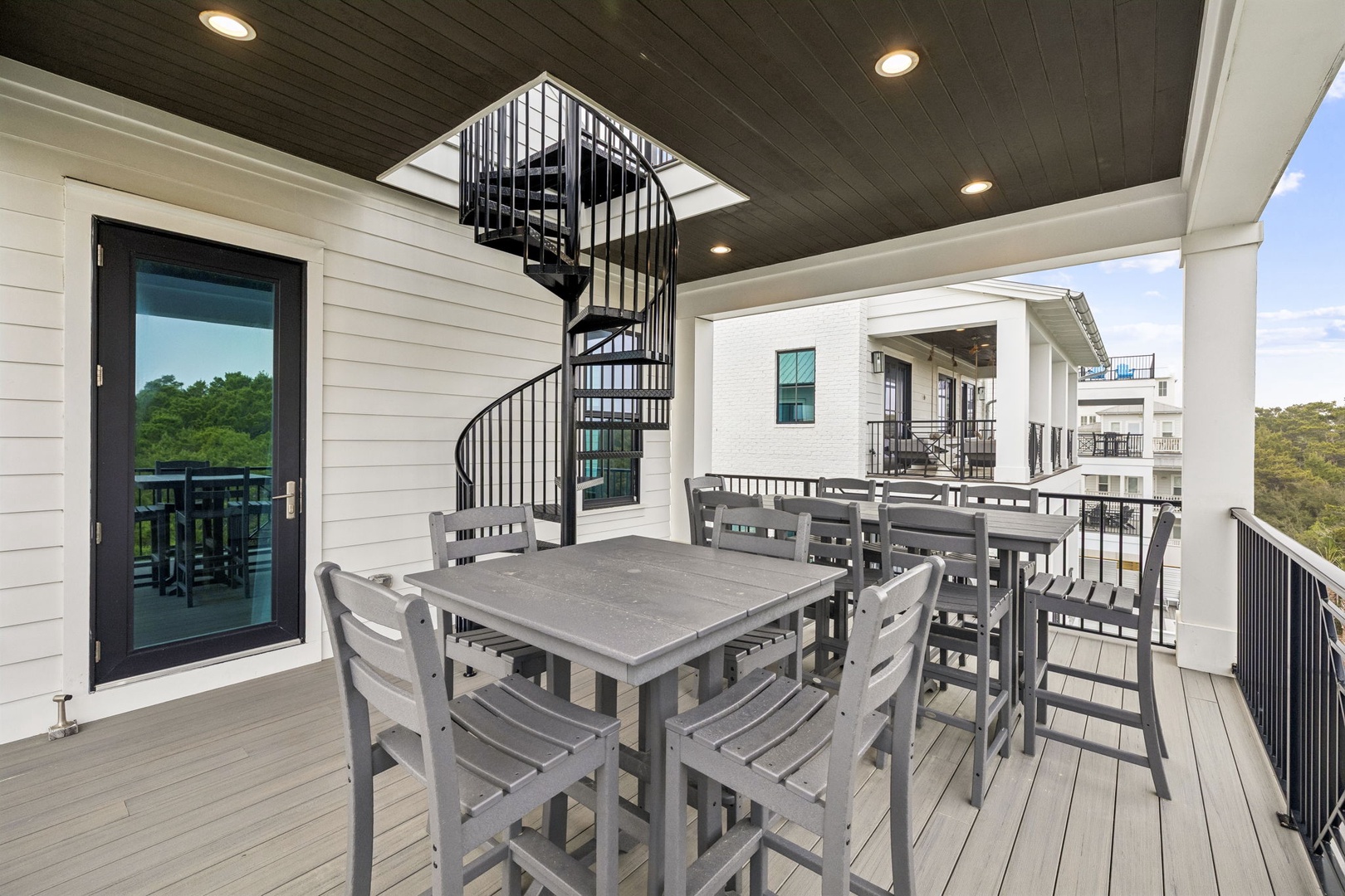 Your private rooftop terrace features dining for eight and a stunning spiral staircase, creating the perfect space for memorable meals under the stars.