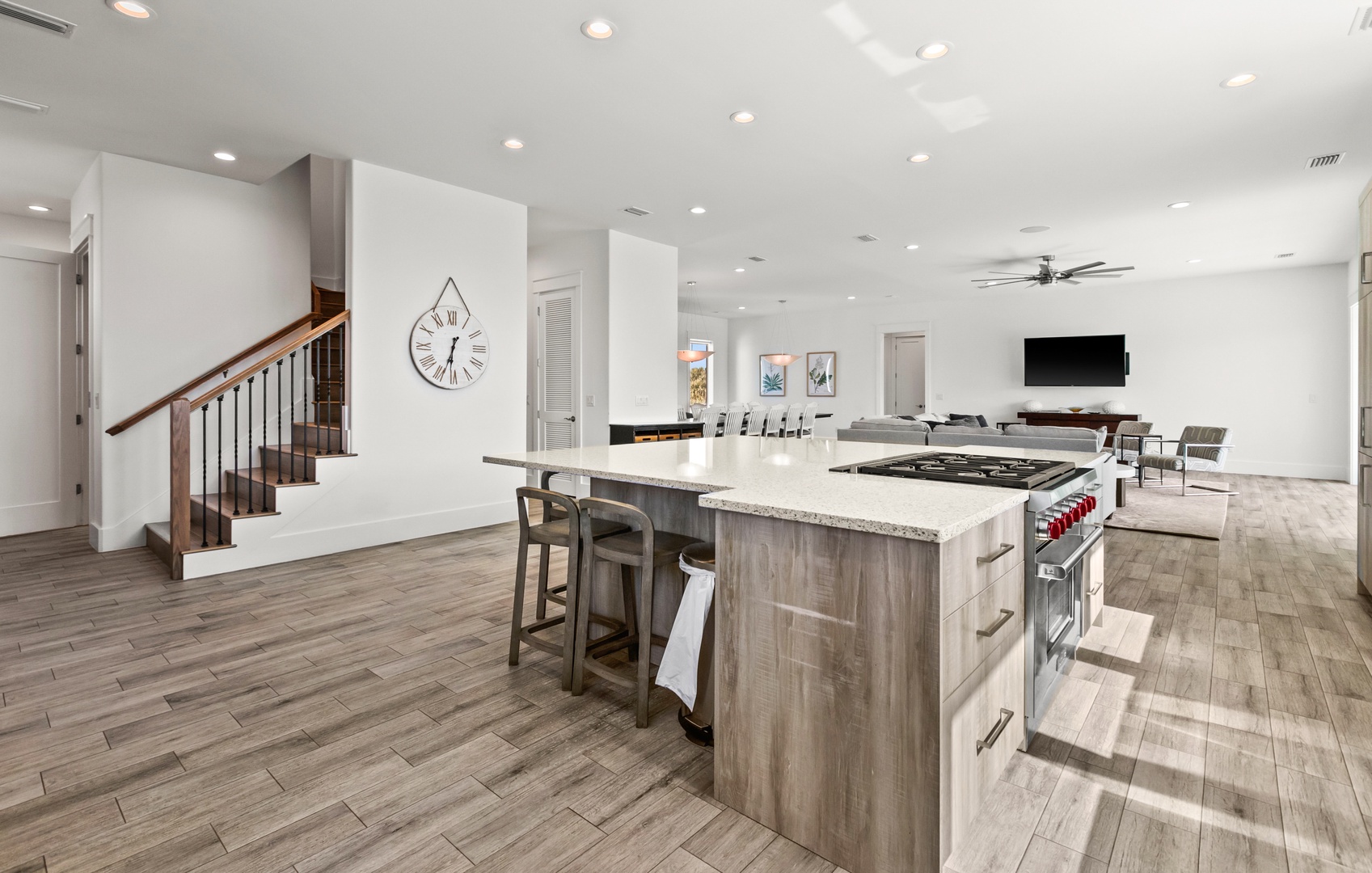 Step into an open, sunlit space where modern elegance meets home comfort. Gather around the sleek island for morning coffee or unwind in the airy living area—your perfect retreat awaits.