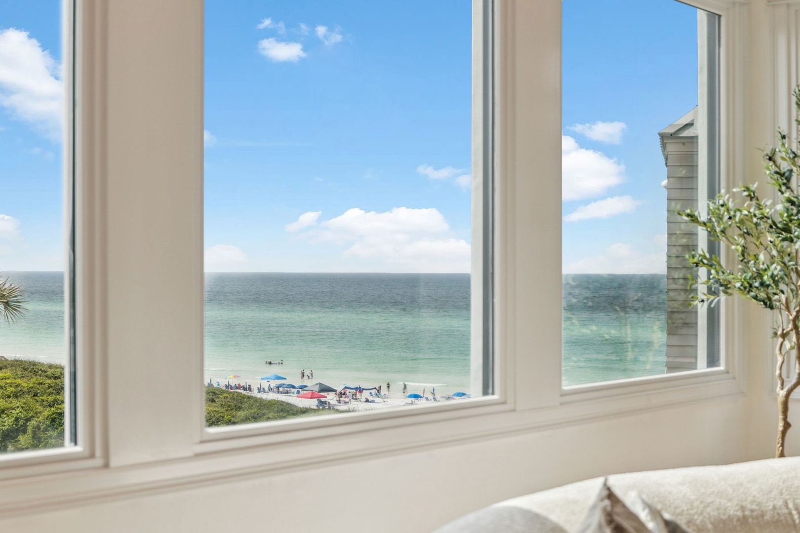Gaze out at turquoise waters and soft white sands right from your window—a peaceful coastal retreat where relaxation begins the moment you arrive.
