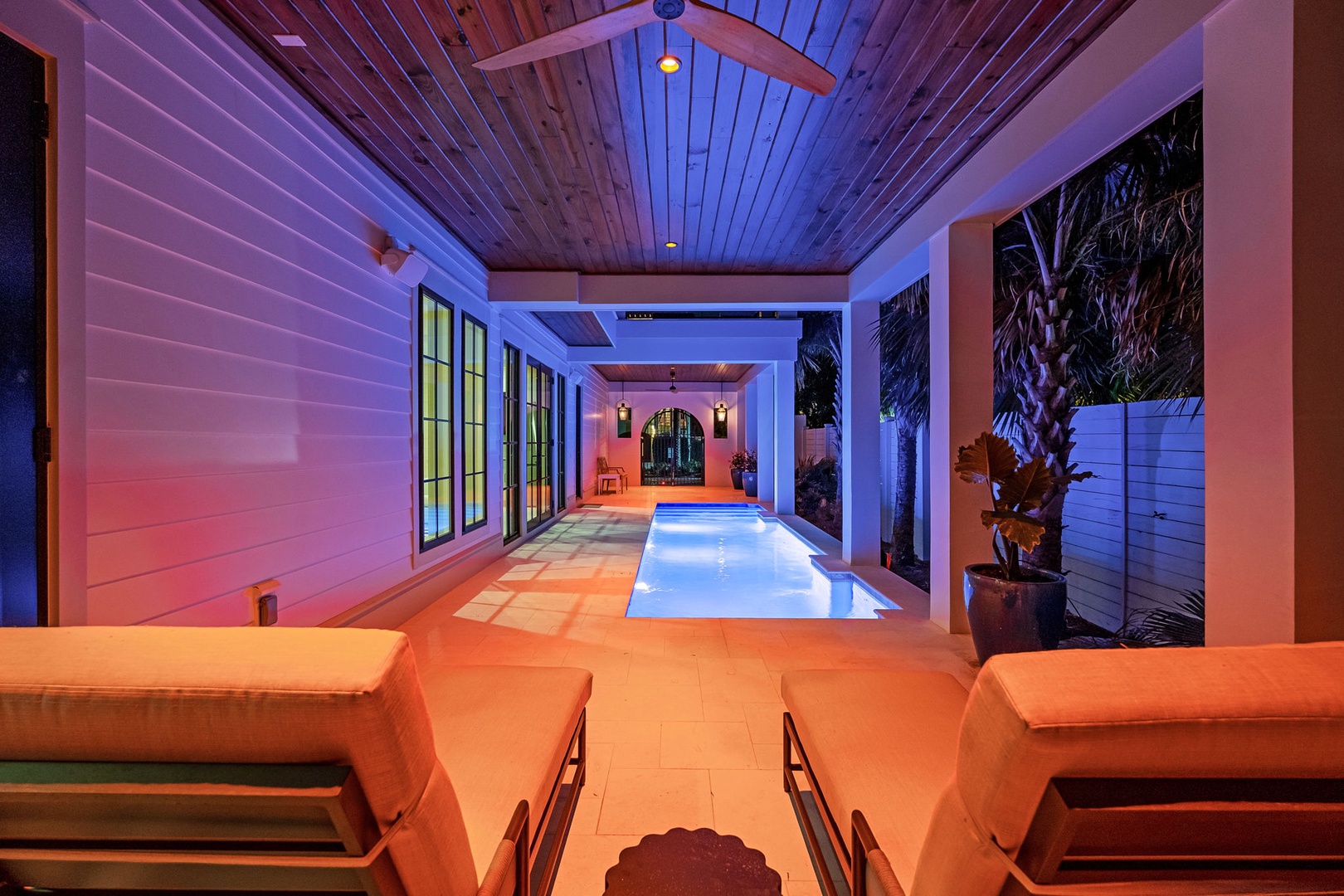 Slip into your private oasis where soft lighting dances across warm waters, creating the perfect evening retreat.