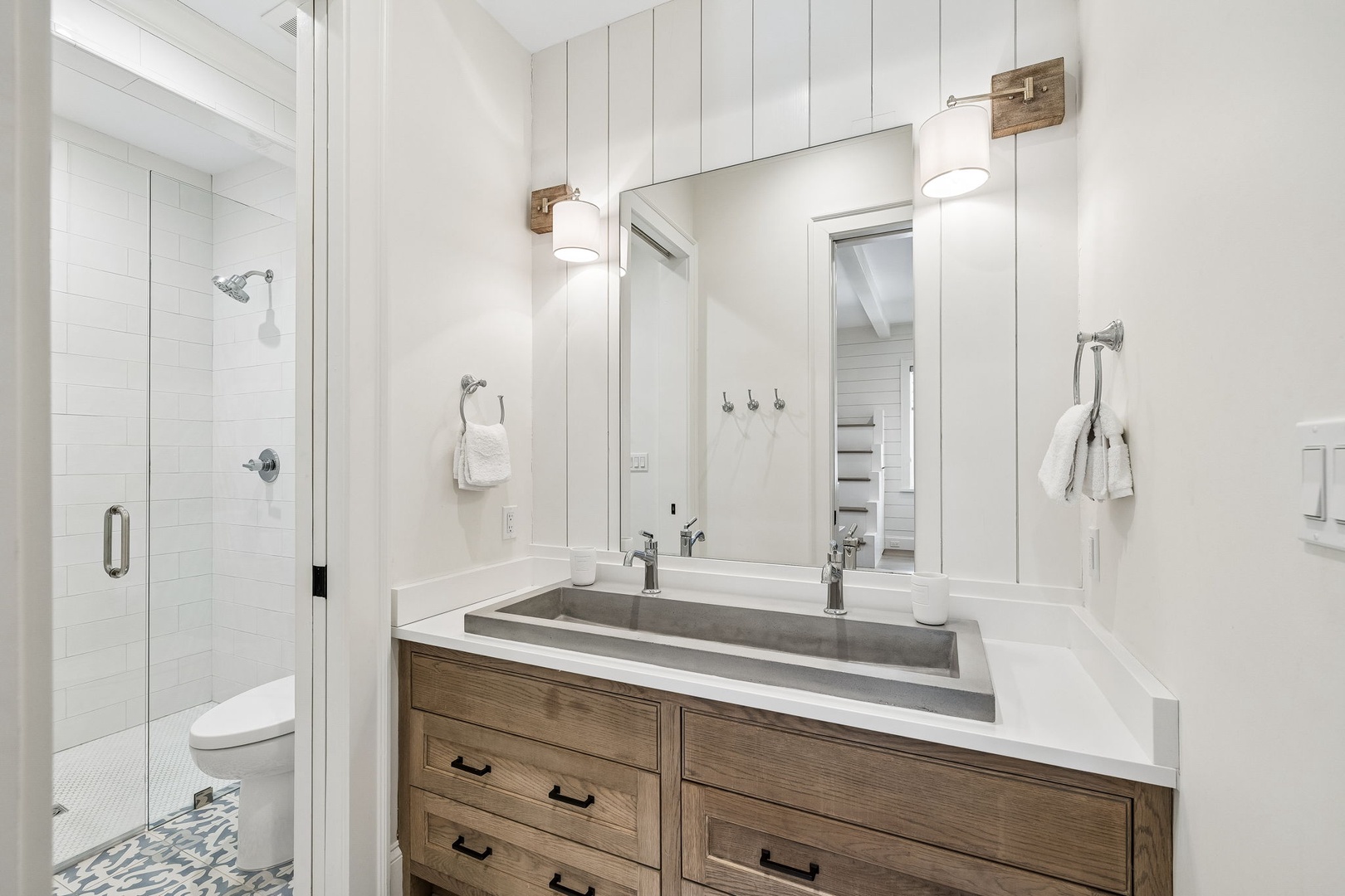 Refresh in this bright, modern bathroom with a double vanity, walk-in shower, and plenty of storage for your essentials.