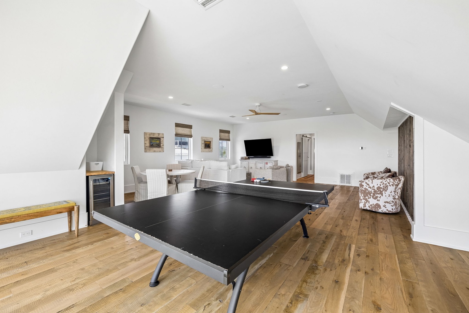 Challenge your travel companions to a game of table tennis, then unwind with your favorite shows in this bright, vaulted loft space designed for fun and relaxation.