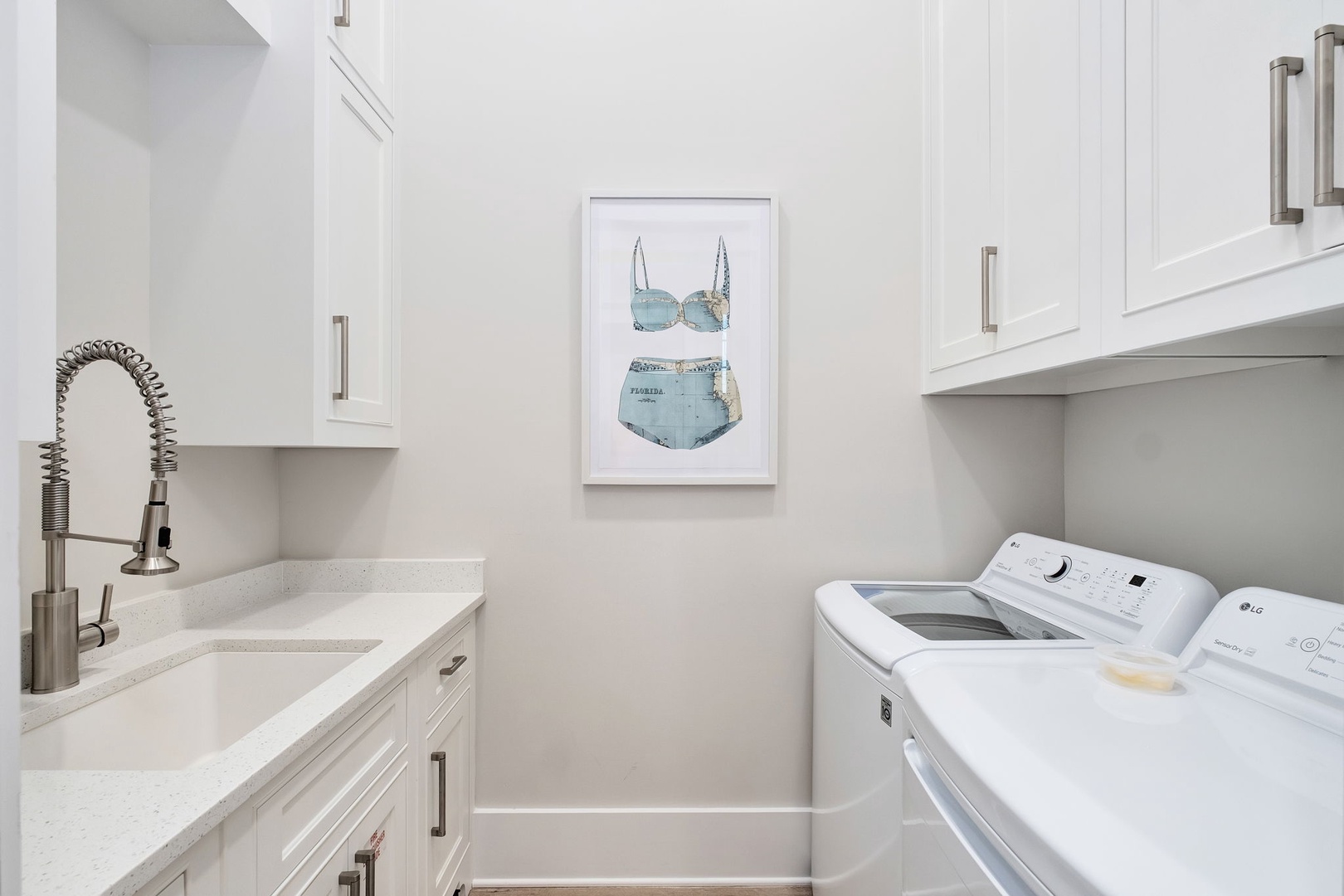 Your dedicated laundry space features modern appliances and a convenient sink for all your washing needs during your stay.
