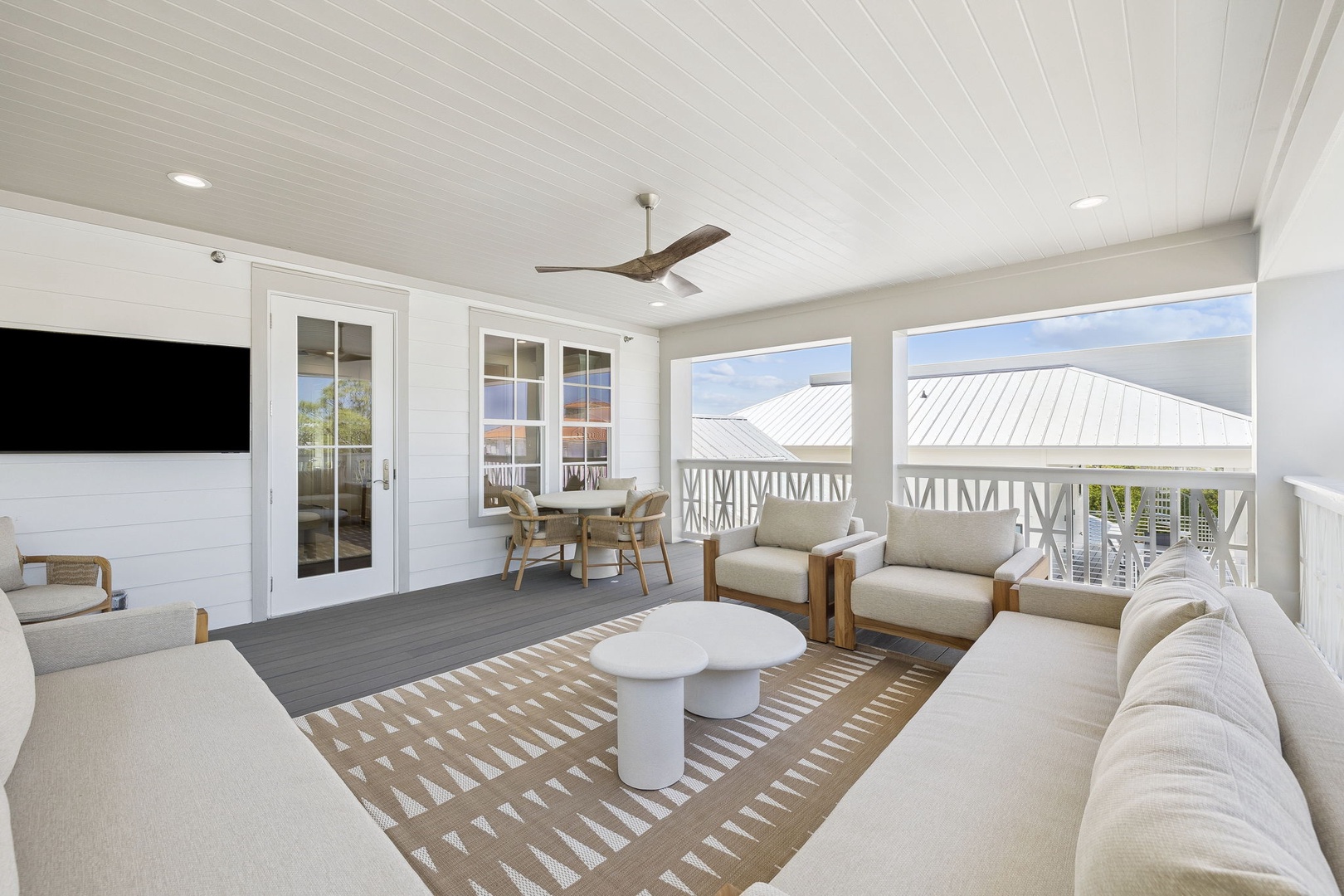 Unwind on your private covered terrace with plush seating, perfect for morning coffee or sunset cocktails.