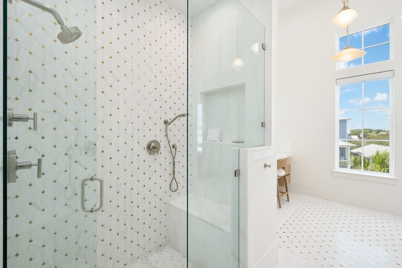 Step into your spa-like retreat with a stunning glass-enclosed shower, elegant fixtures, and peaceful natural light that makes every morning feel refreshing.