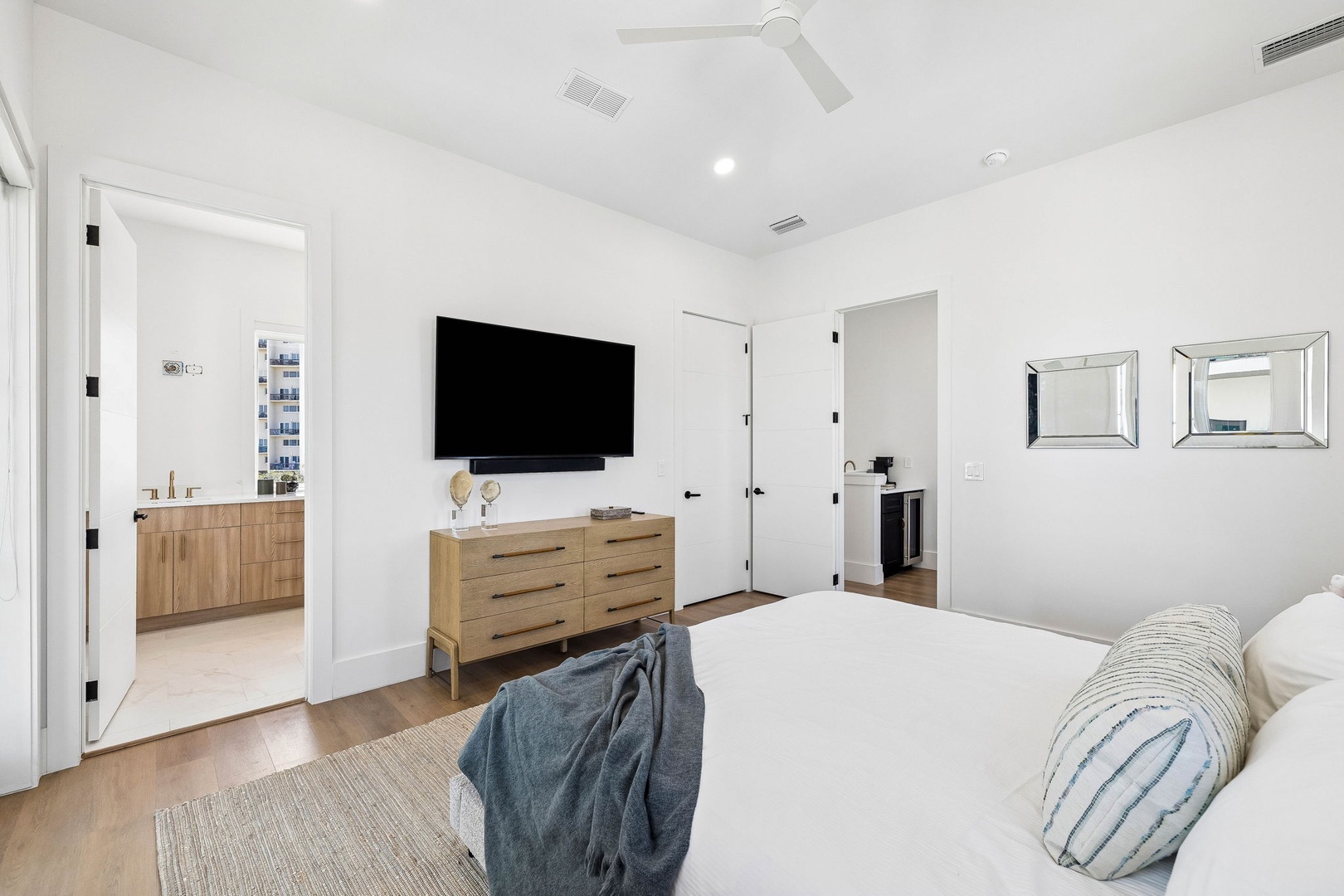 Unwind in your serene suite, complete with a plush bed, modern entertainment, and private ensuite access for your comfort.