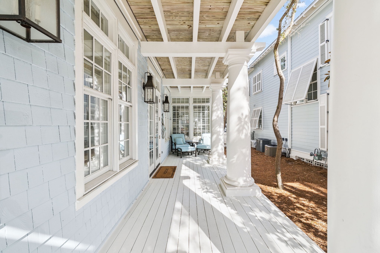 Step onto your private covered porch and feel the gentle breeze flow through this peaceful outdoor sanctuary, perfect for morning coffee or evening relaxation.