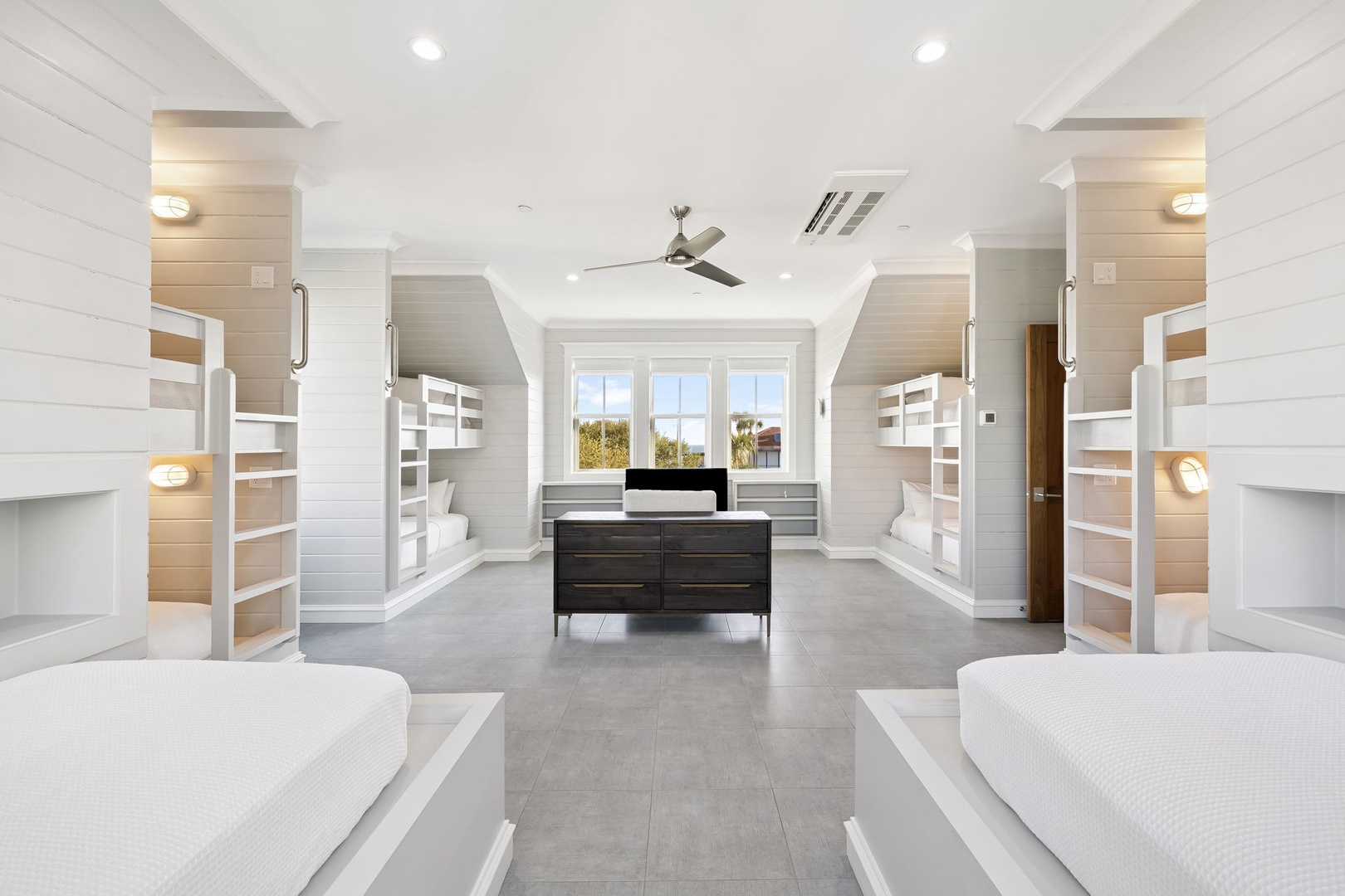 Discover your perfect family retreat with custom bunk beds, built-in storage, and cozy reading nooks bathed in natural light.