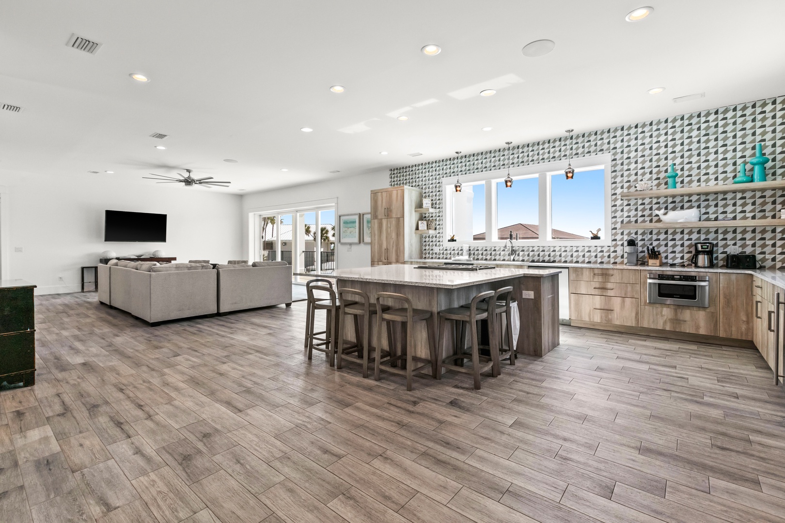 Spacious open-plan living with a chef's kitchen and bright natural light—your perfect home base for unwinding after sun-soaked days.