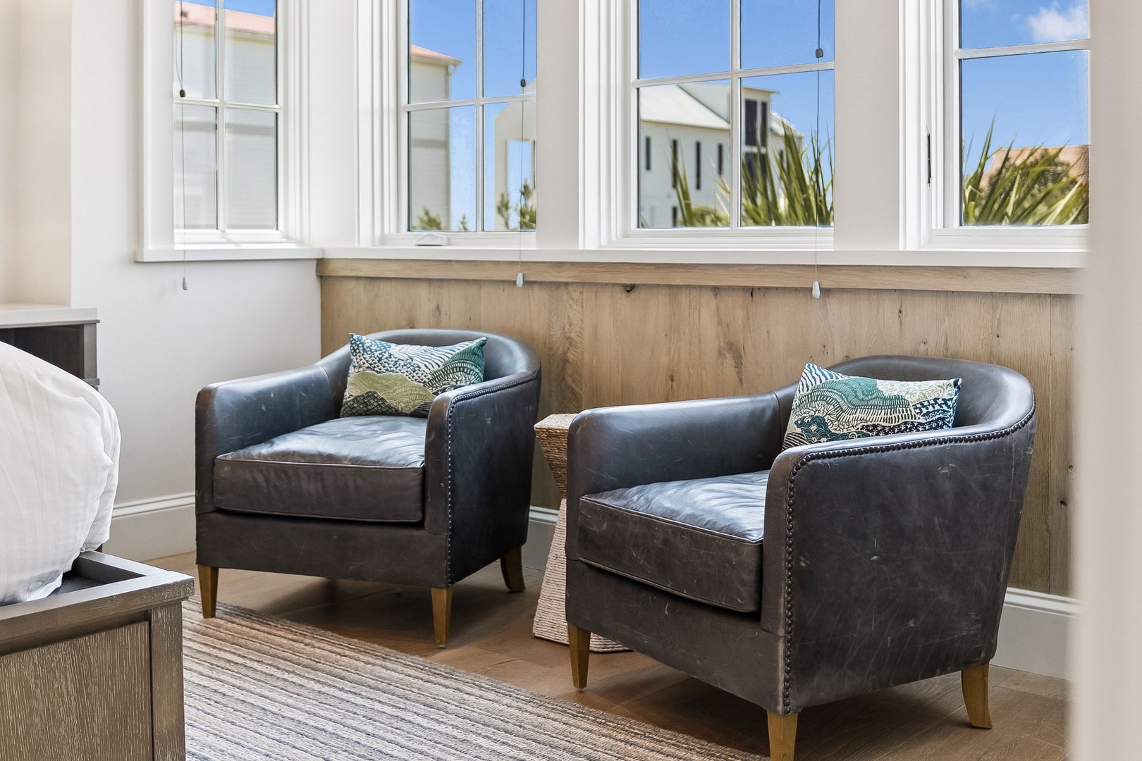 Sink into plush leather armchairs by your window and watch the neighborhood come to life. Perfect for morning coffee or unwinding with a good book.