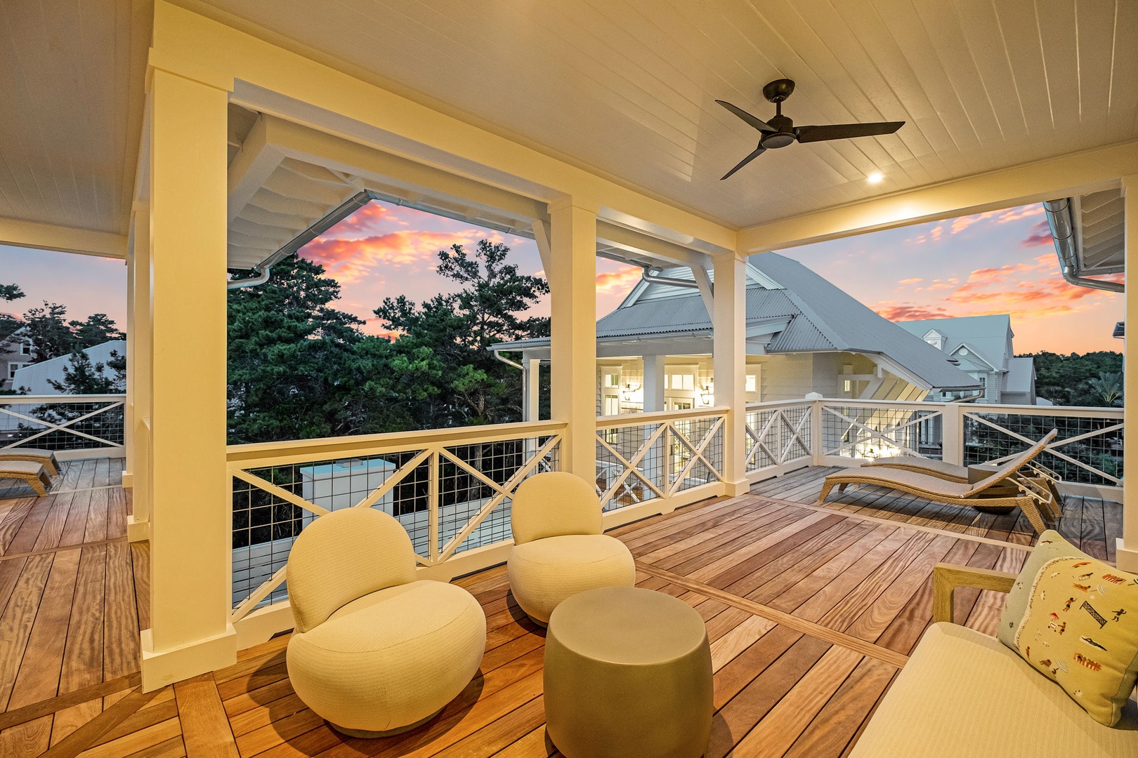 Step onto your private covered deck and take in the stunning sunset views from a peaceful perch above the treetops. Unwind on comfortable lounge seating as daylight fades into evening.