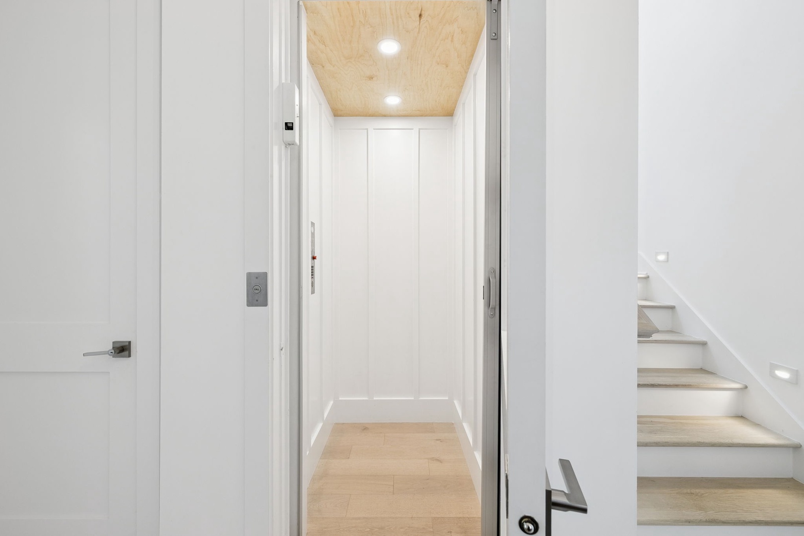 Your private entrance welcomes you with clean lines and natural wood accents creating an instantly calming arrival experience.