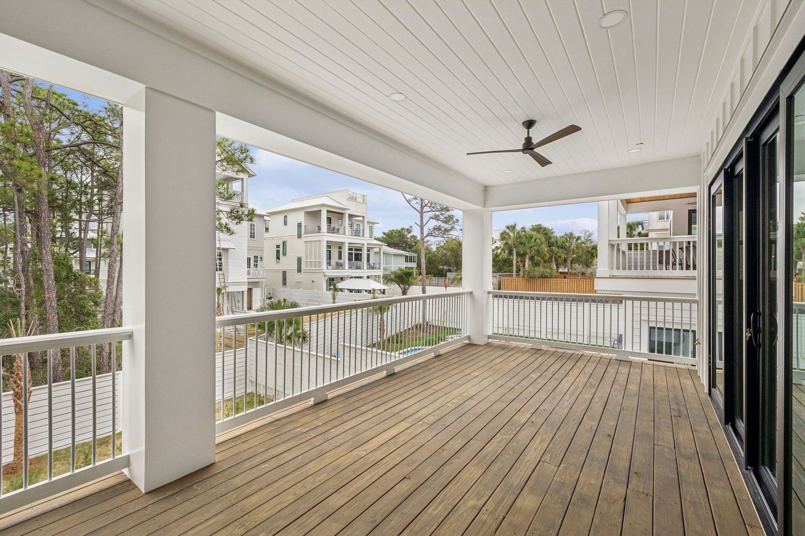 Relax on your spacious covered balcony with neighborhood views, complete with ceiling fan for those warm afternoons.