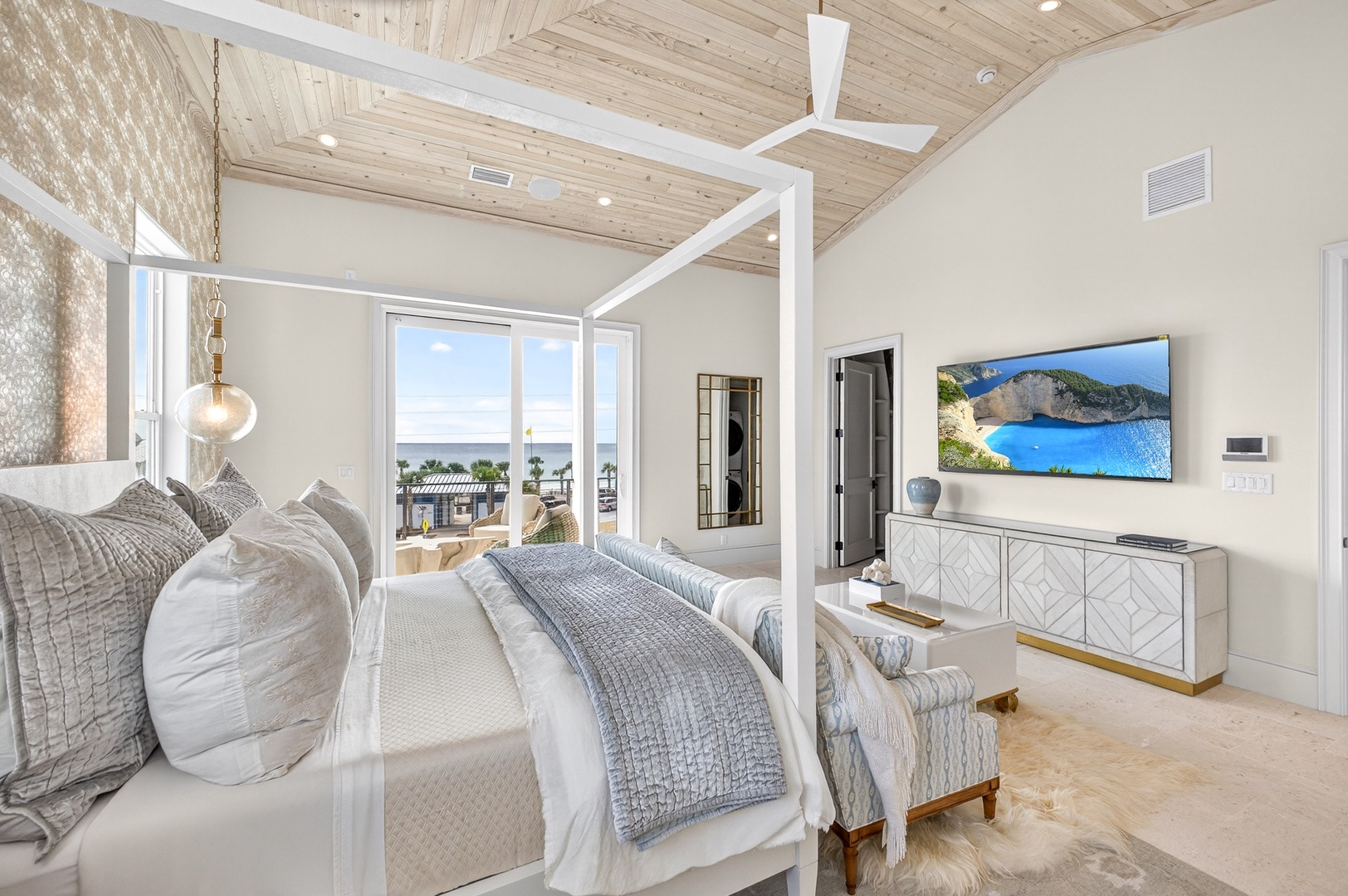 Unwind in your elegant bedroom sanctuary with ocean views and modern comfort.