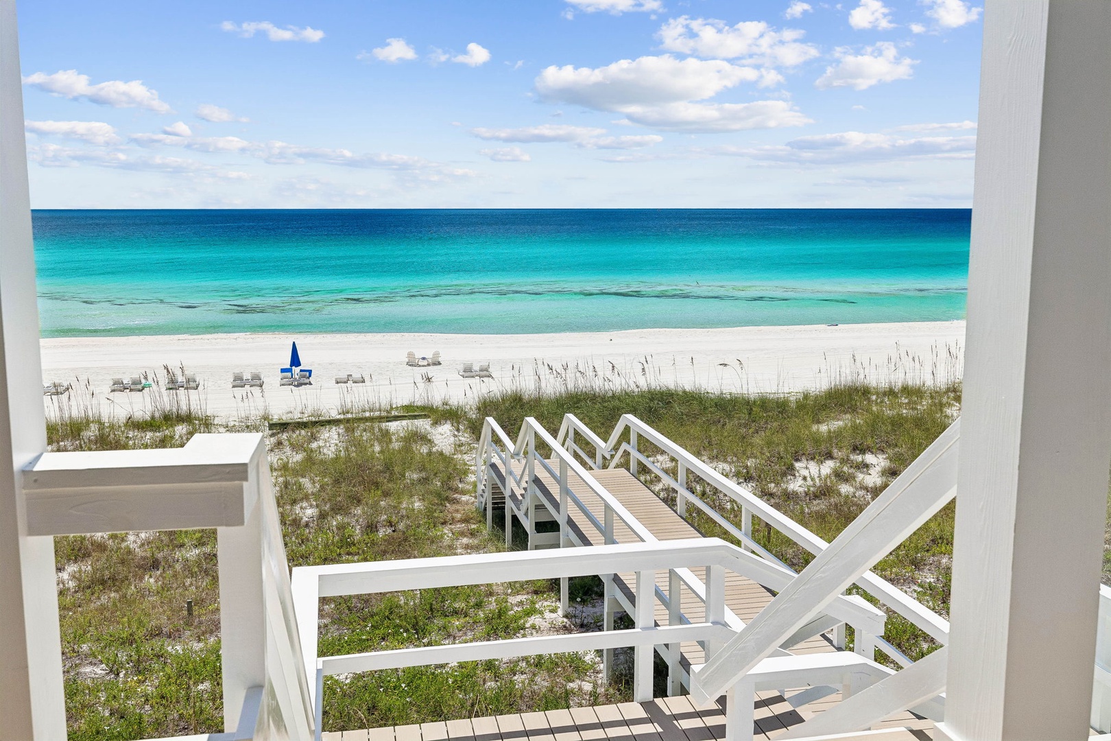Step directly onto pristine white sand and gaze at turquoise waters stretching to the horizon—your own private path to paradise awaits just beyond your door.