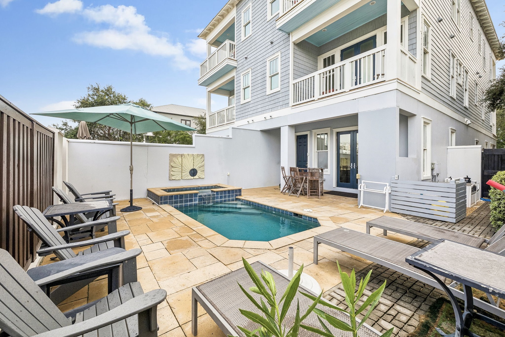 Your private oasis awaits with a sparkling pool, sunny loungers, and plenty of space to relax outdoors with family or friends.