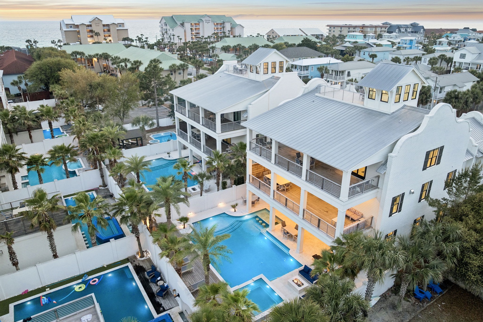 This stunning estate features a massive resort style pool and luxury amenities in a prime coastal setting.