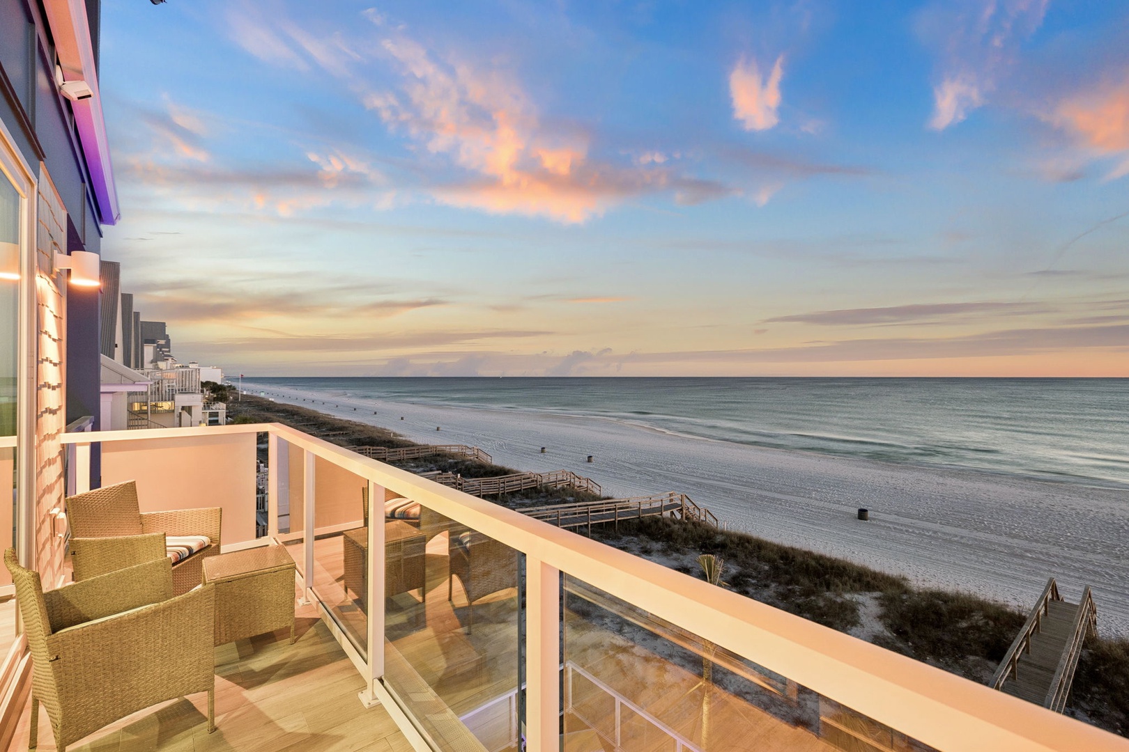 Step onto your private balcony for breathtaking ocean views and stunning sunset colors painting the sky.
