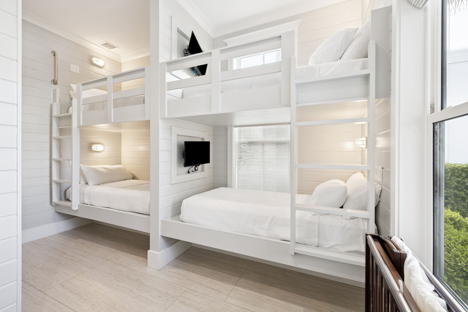 Drift off to dreamland in your custom built-in bunks, each with personal reading lights and privacy screens for ultimate comfort.