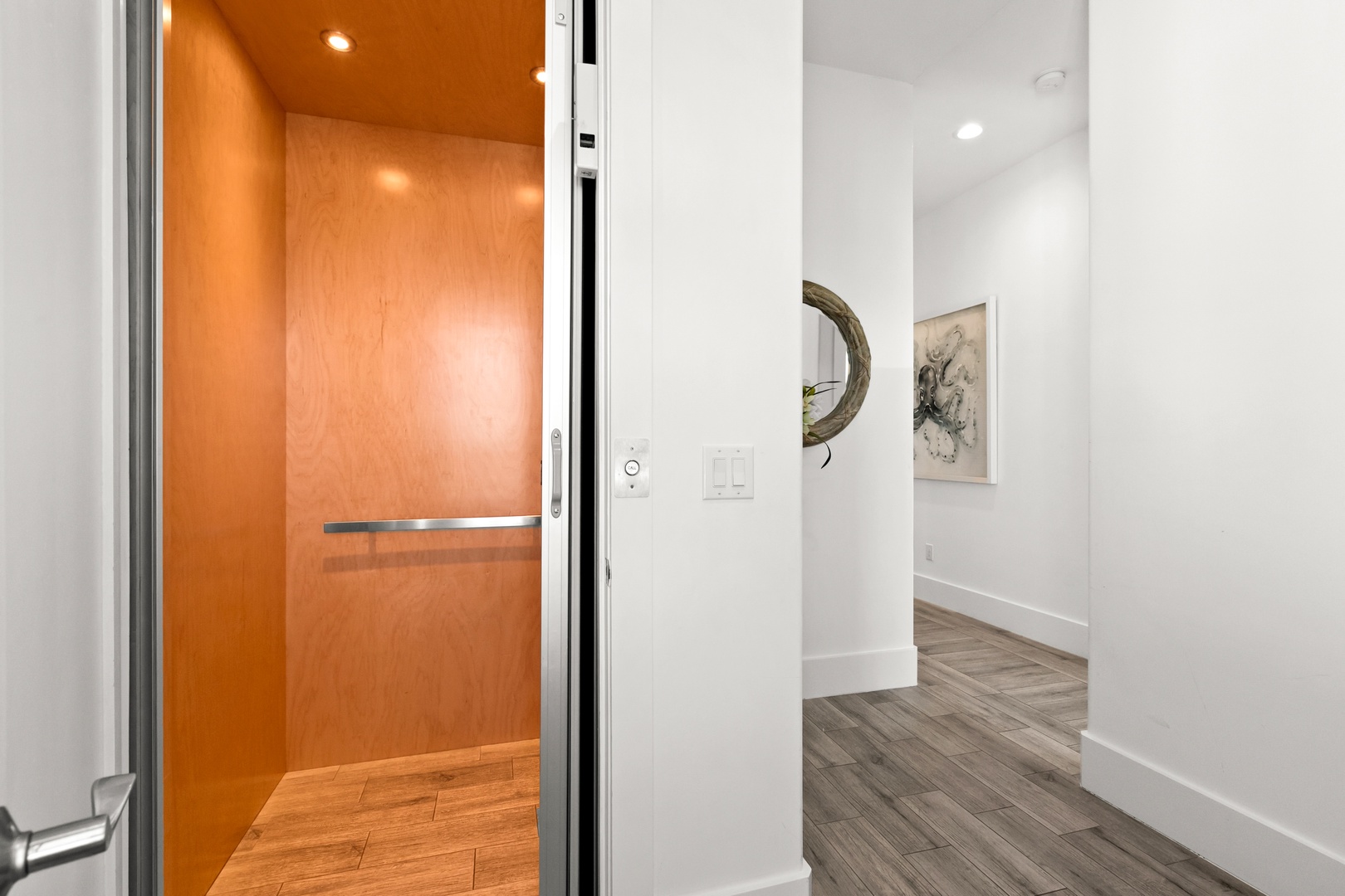 Step into your private elevator that opens directly into your stylish entryway, where modern design meets effortless convenience.