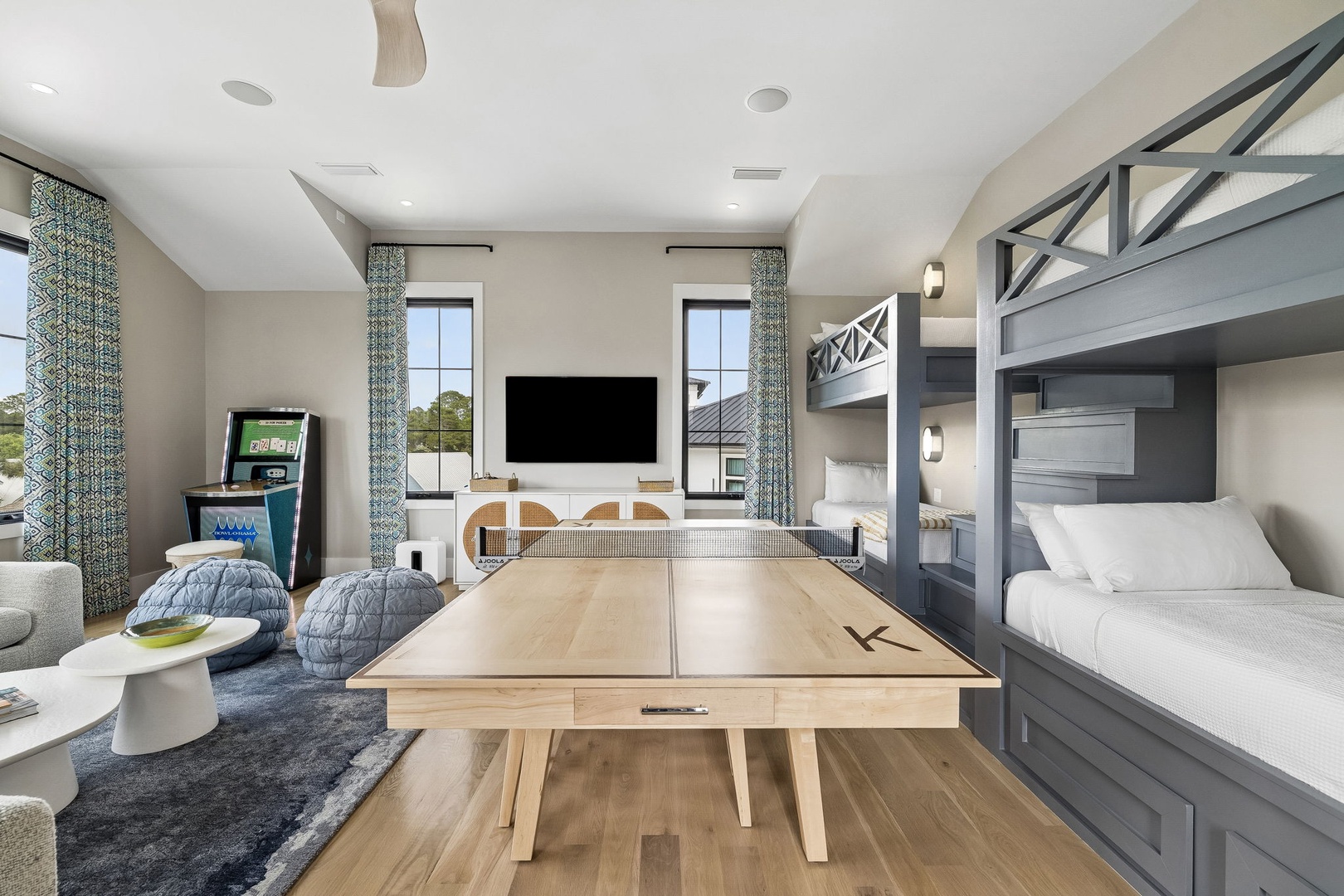 Your spacious retreat blends comfort and fun with custom bunk beds, a game-ready table, and a cozy lounge to unwind after adventures.