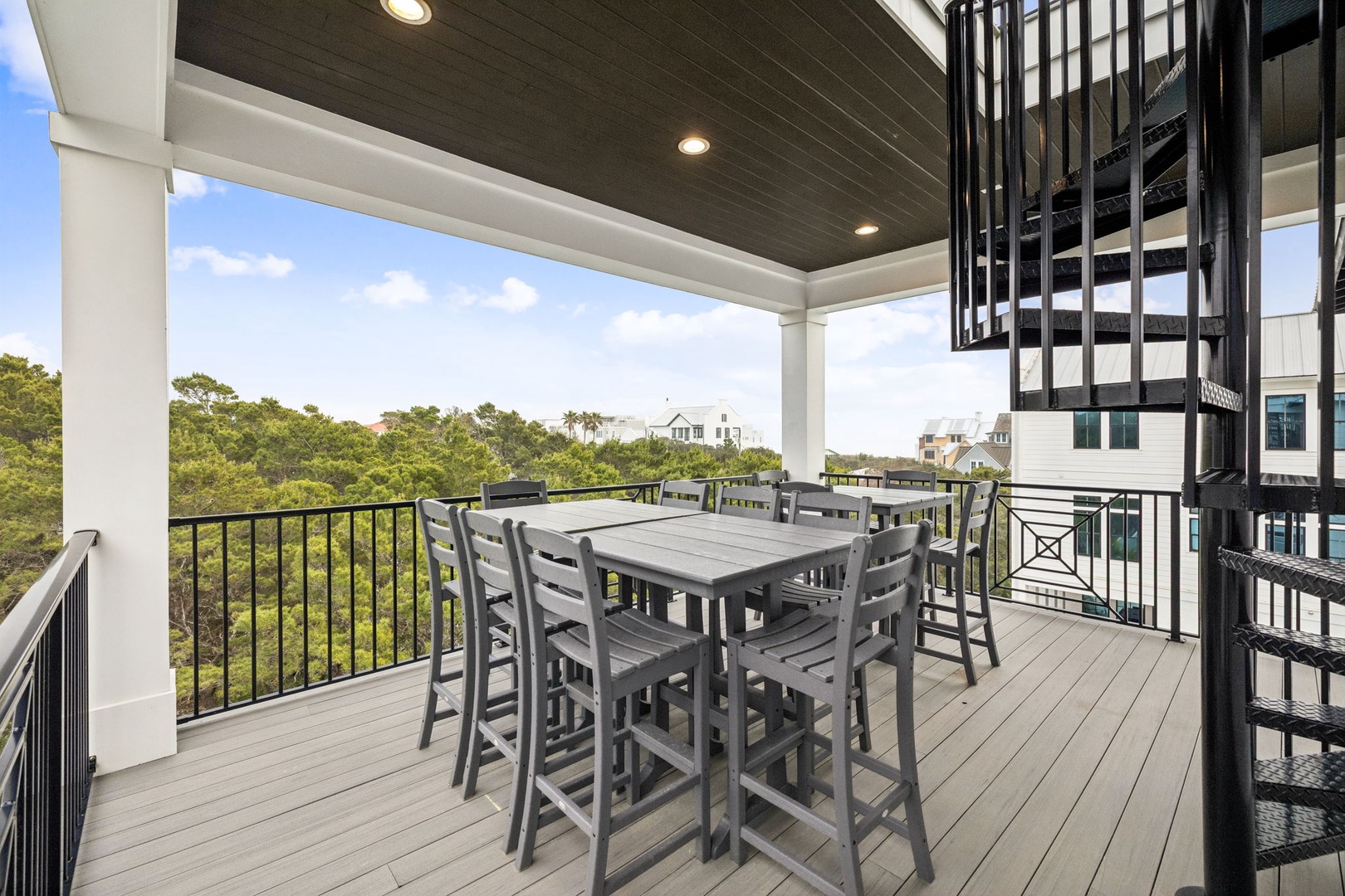 Gather around your private dining table on this covered deck, where treetop views create the perfect backdrop for meals together.