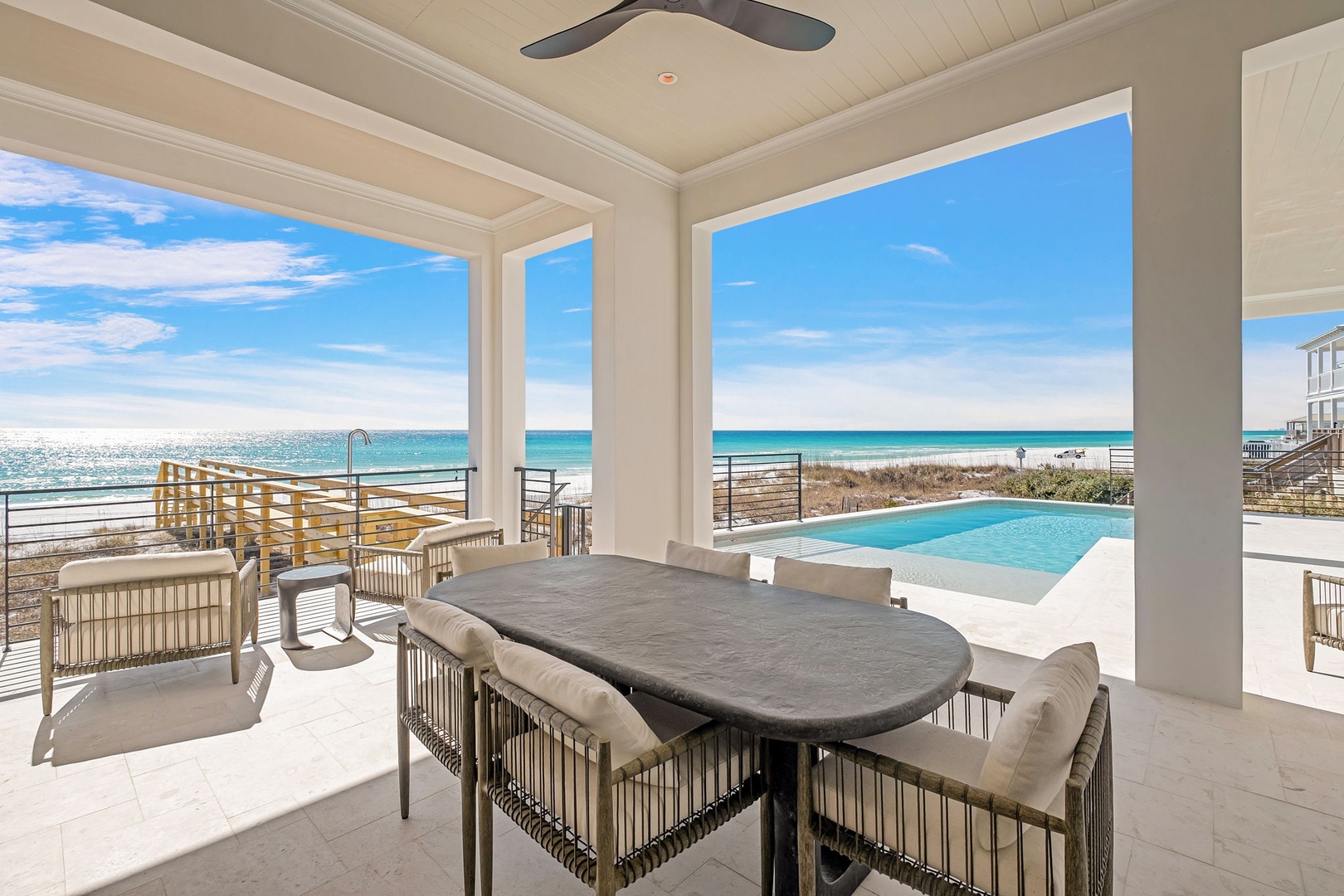 Dine with breathtaking ocean views from your covered terrace, where the pool and pristine beach create your perfect backdrop.