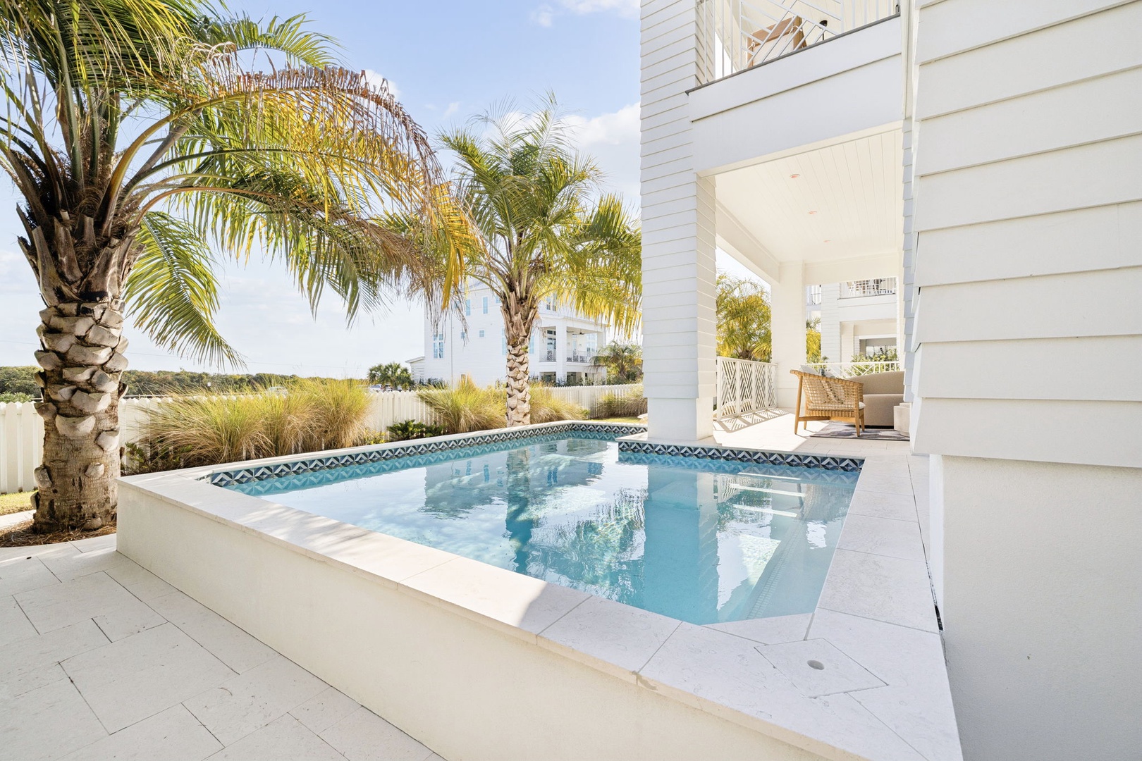 Your private pool beckons under swaying palms, with crystal-clear waters reflecting tropical skies for pure relaxation.