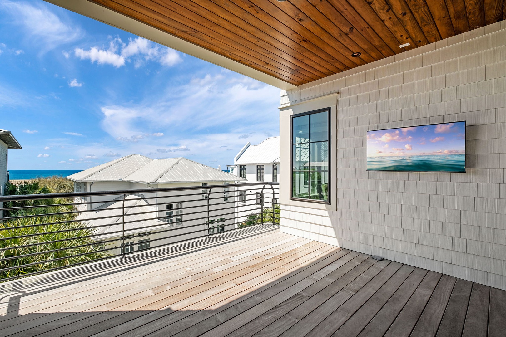 Step onto your private deck where ocean breezes meet coastal views, complete with outdoor entertainment perfect for morning coffee or sunset cocktails.