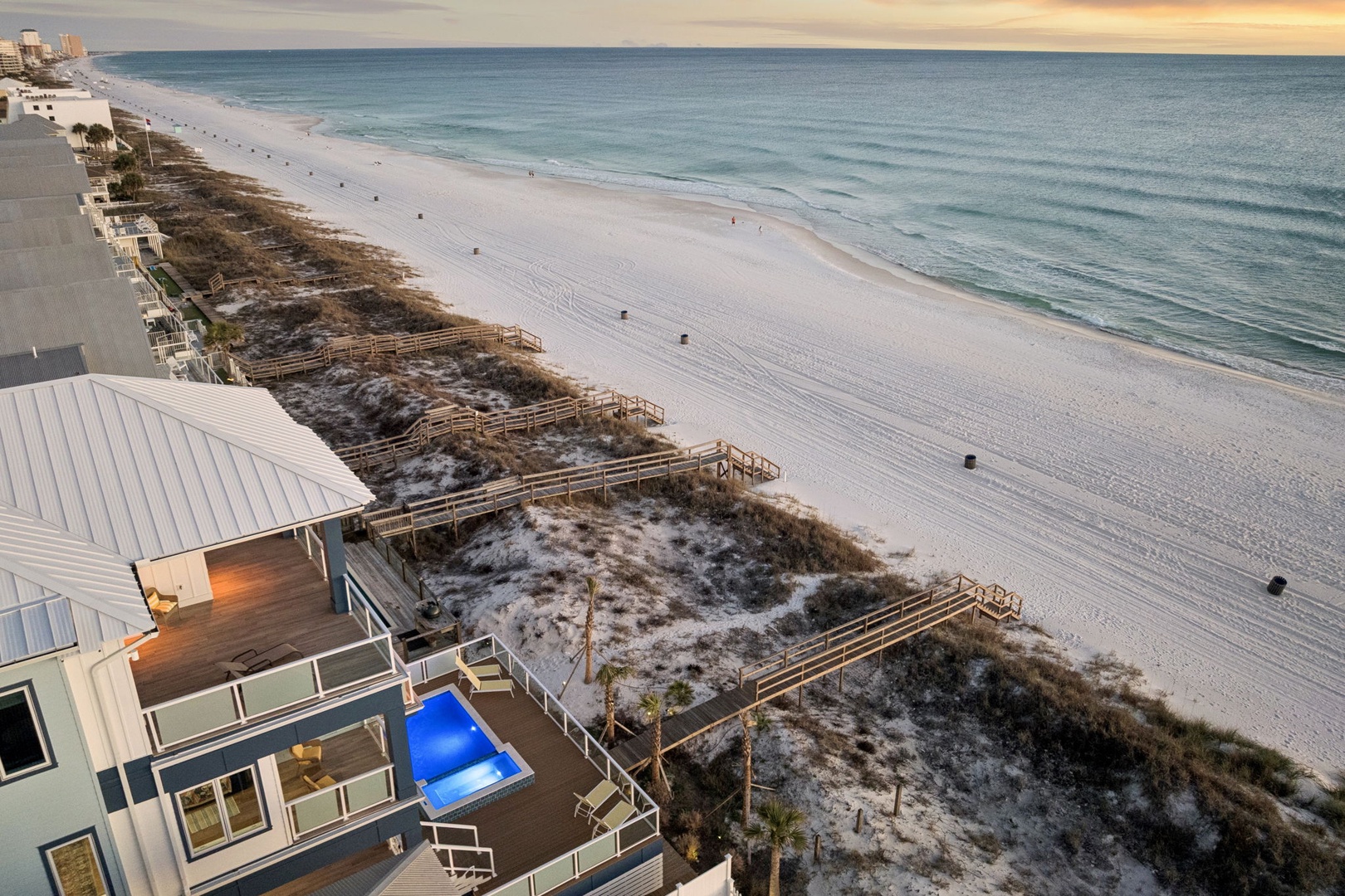 Stunning beachfront property with direct access to pristine white sand beaches and turquoise waters along the Gulf Coast.