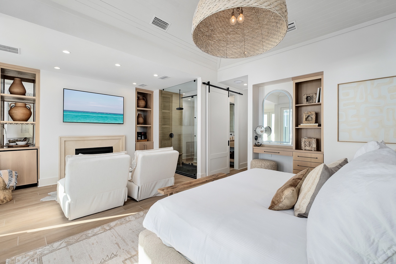 Retreat to your luxurious suite where ocean views meet spa-style comfort—your private sanctuary with fireplace and glass-enclosed shower awaits.