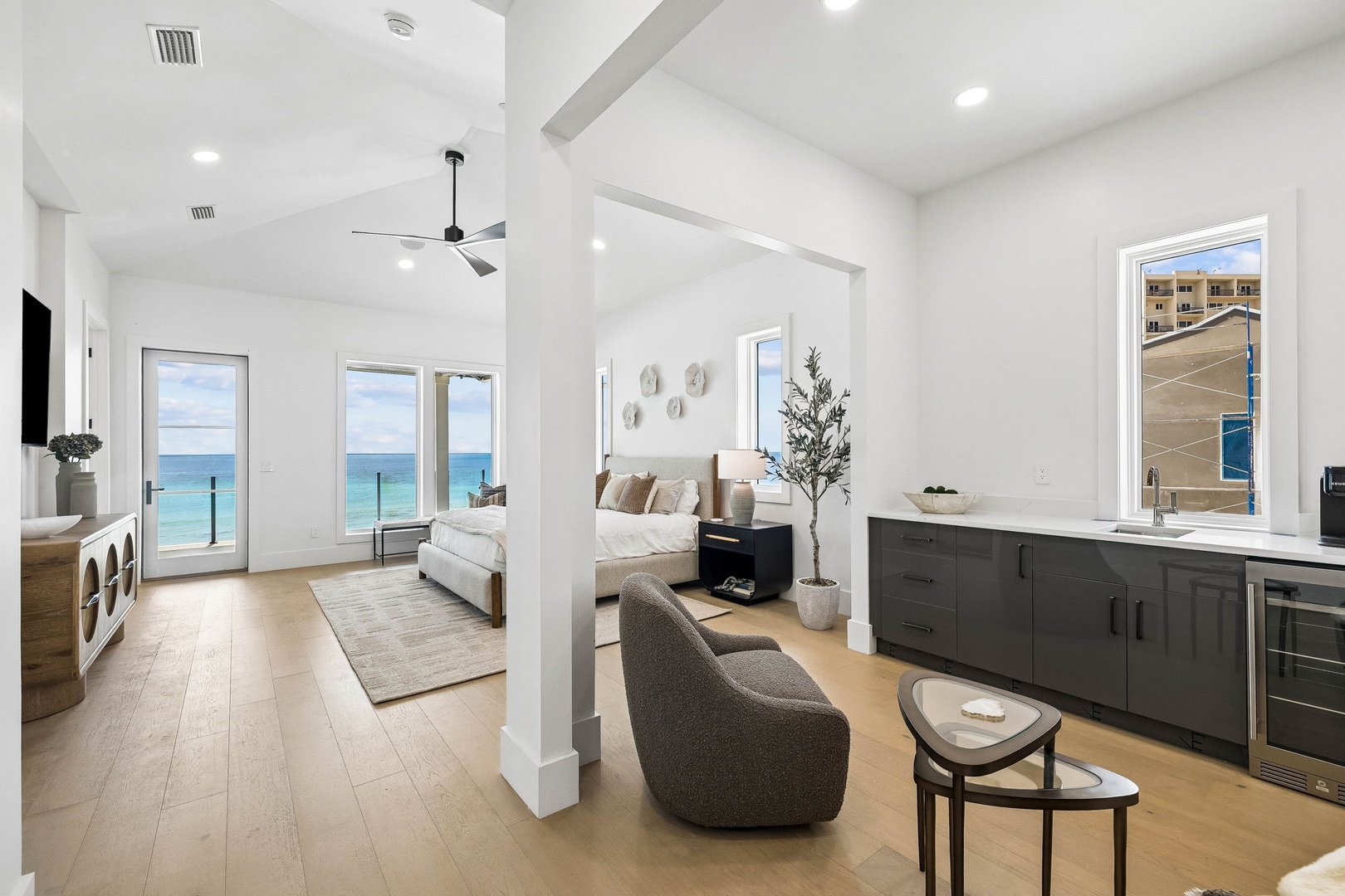 Step into your bright, airy retreat where ocean breezes and natural light create the perfect coastal escape—your private beachfront sanctuary awaits.