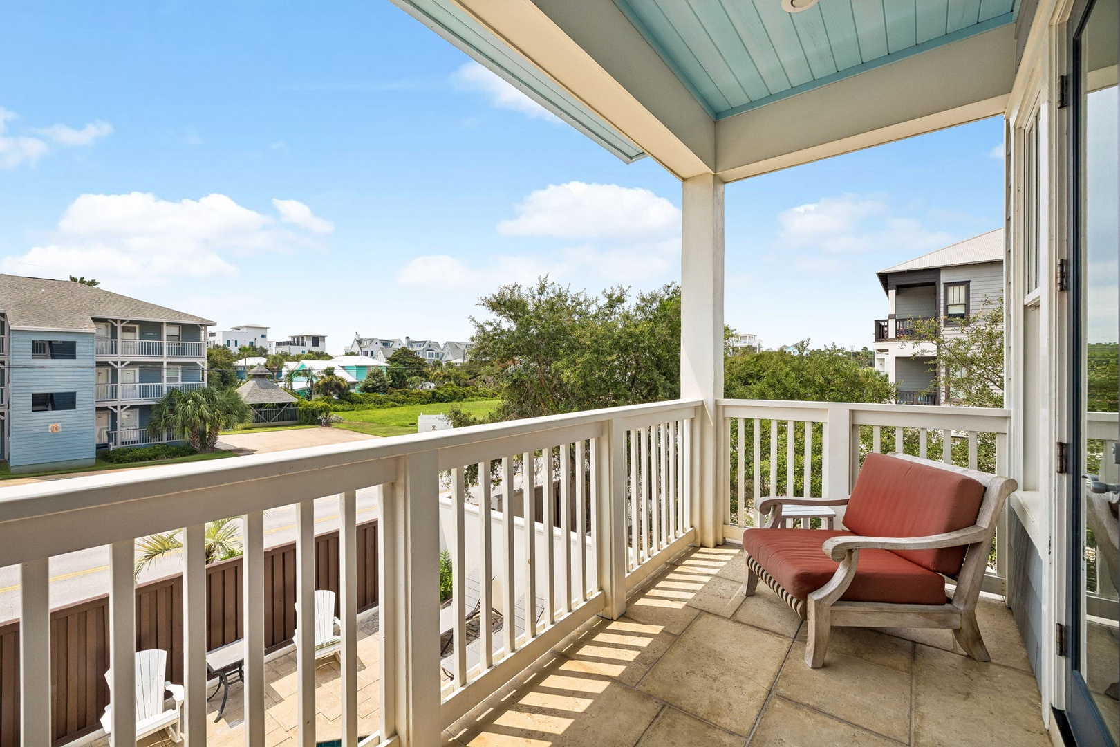 Settle into your private balcony chair and soak in the sunshine as you gaze out over lush greenery and neighboring beachside homes. The perfect spot to start your morning with coffee or unwind after a day of adventure.