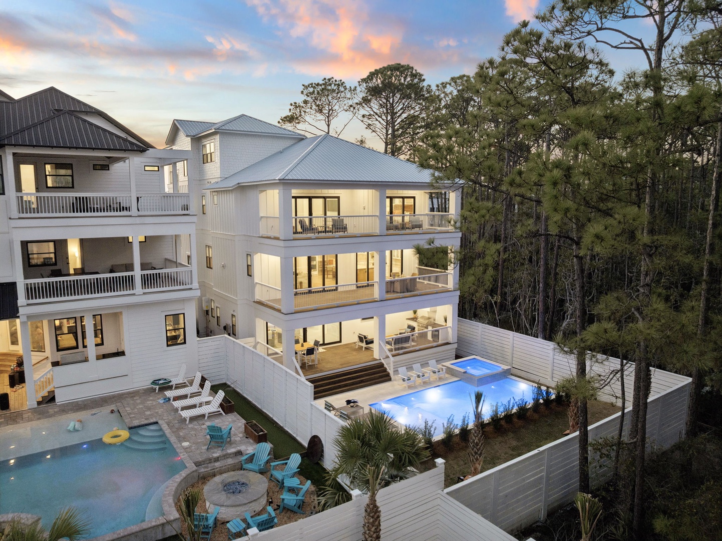 Stunning beachside retreat featuring multiple levels of luxury accommodations with private pools and lush forest surroundings.