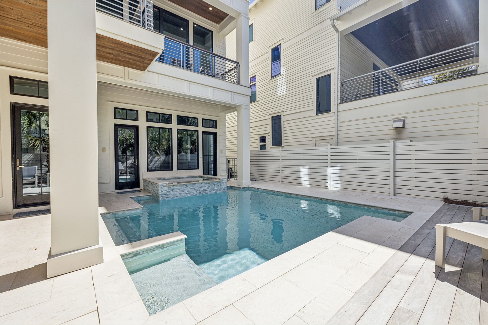Your private pool oasis awaits in this stunning courtyard, where you can cool off while enjoying complete privacy surrounded by modern architecture.