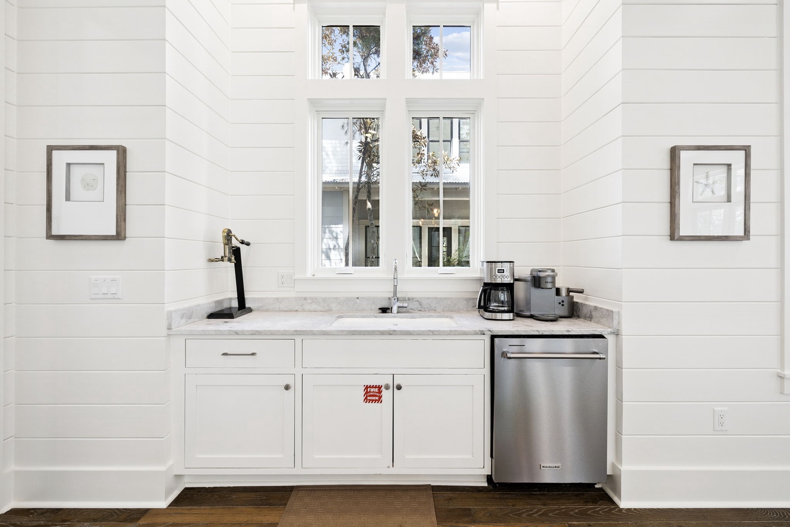 Your bright kitchenette features marble counters, stainless appliances, and coffee facilities for convenient meal prep during your stay.