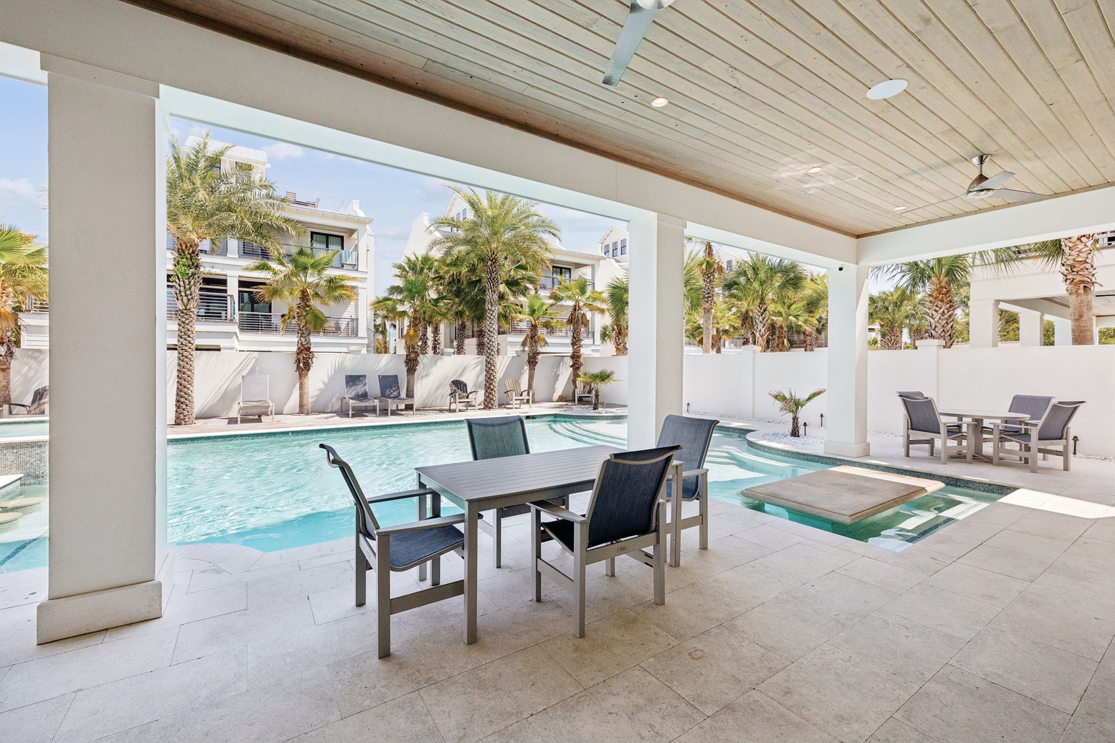 Gather around your private poolside dining table, where meals become memorable under the tropical breeze and swaying palms.