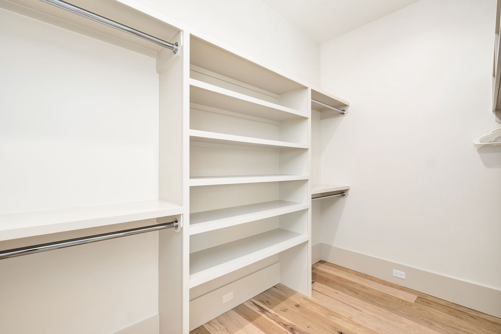 Your spacious walk-in closet offers abundant storage with custom shelving and hanging rods to organize all your belongings effortlessly.